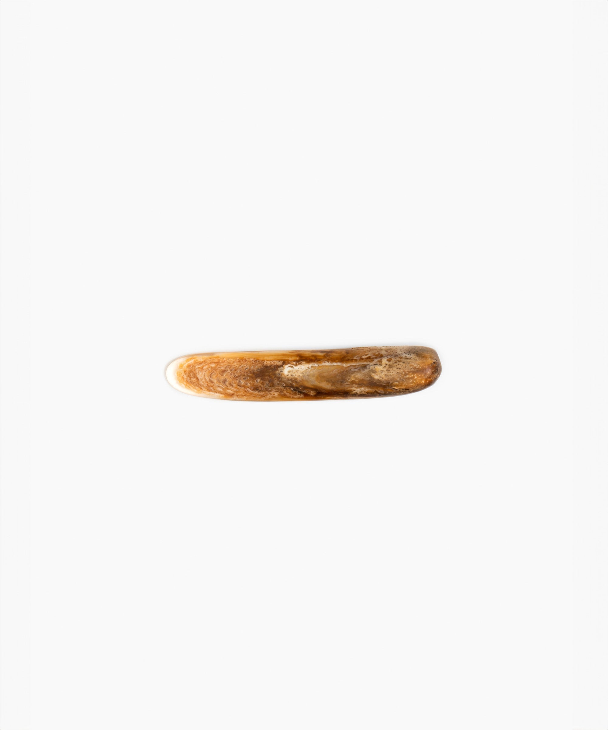 Dinosaur Designs Stone Butter Knife in Light Horn Colour resin