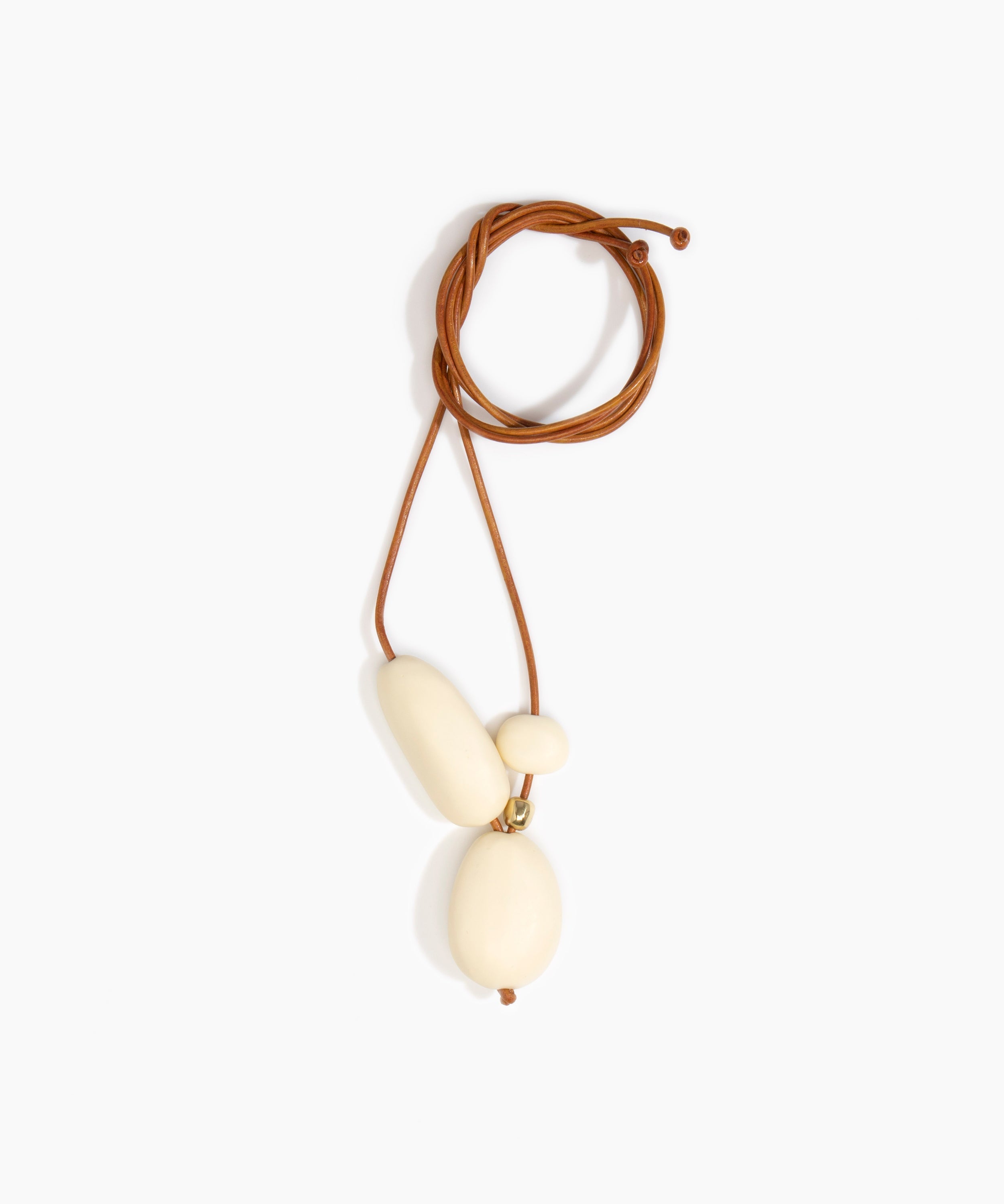 Dinosaur Designs Rock Cluster Pendant in Cream Colour resin with Nano-Coated Brass Bead Material