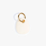 Dinosaur Designs Earth Keyring in Cream Colour resin with Brass Metal
