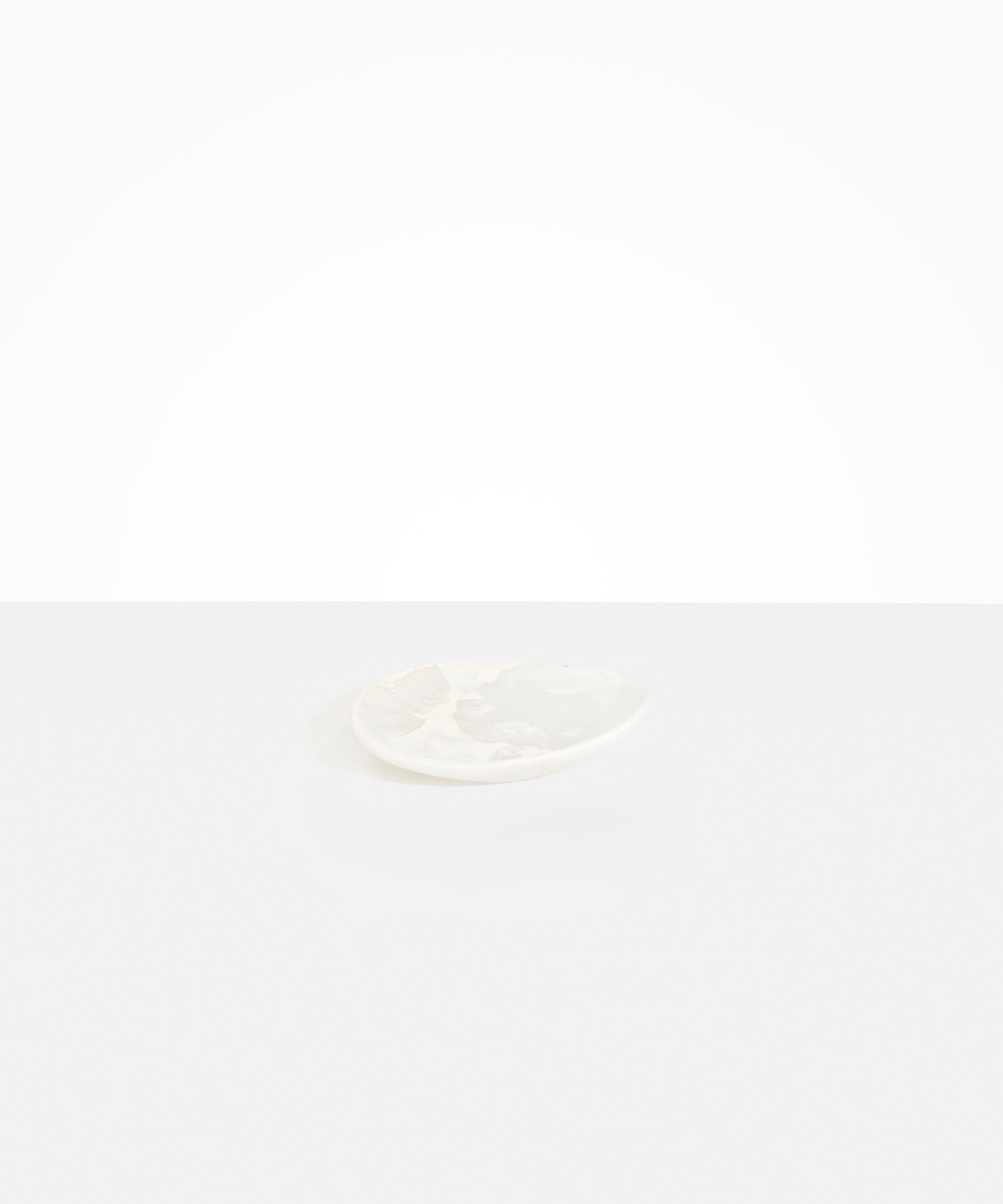 Dinosaur Designs Pebble Side Plate in Snow Swirl Colour resin