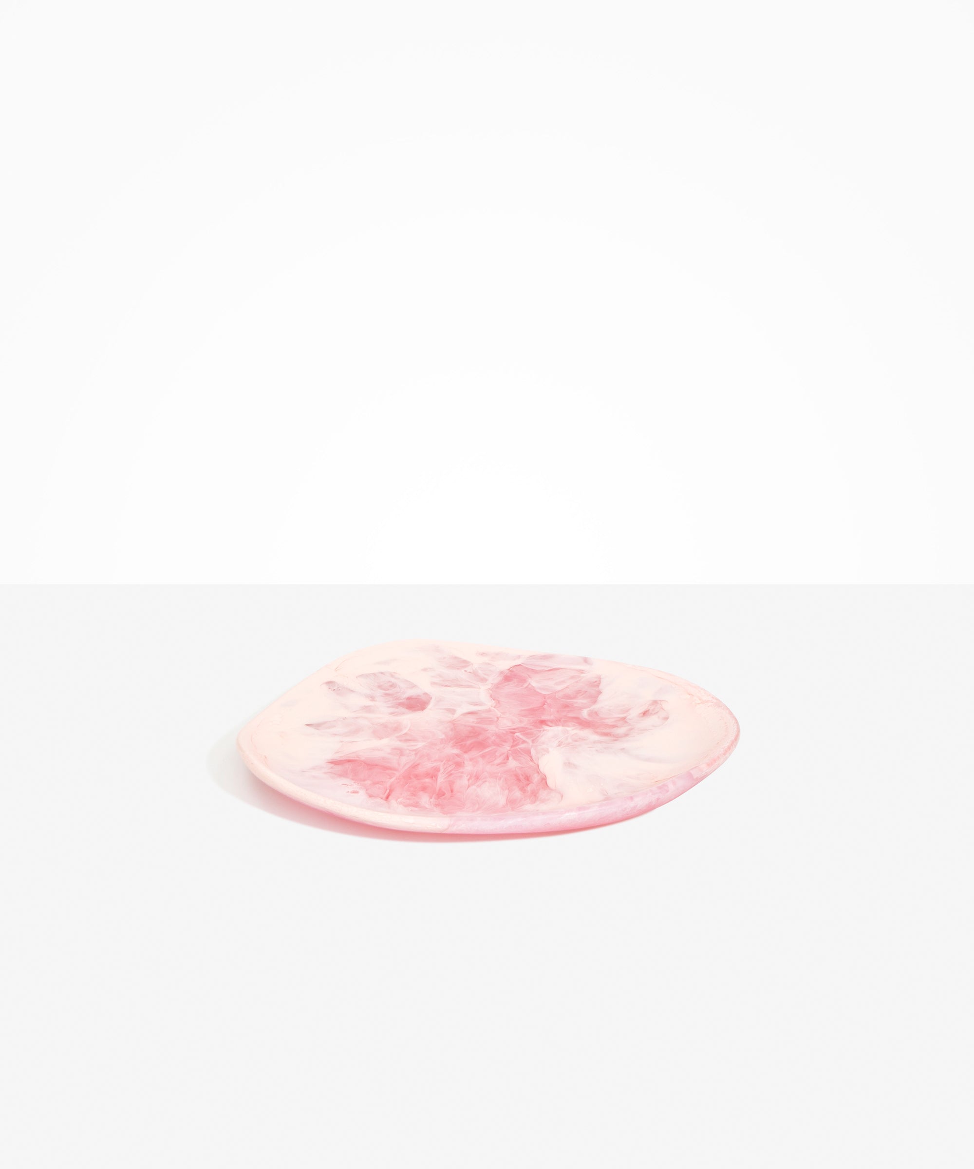 Dinosaur Designs Pebble Plate in Shell Pink Colour resin