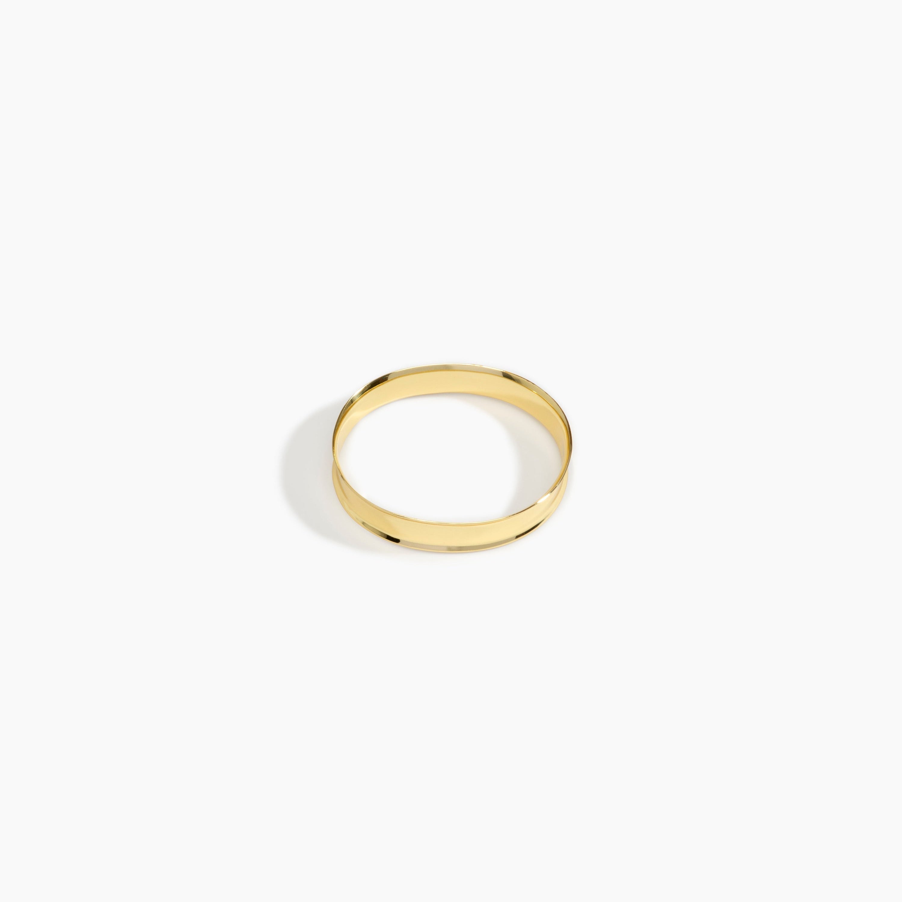 LO Collections x ALEX AND TRAHANAS Narrow Voyage Bangle in Nano-Coated Brass Material...
