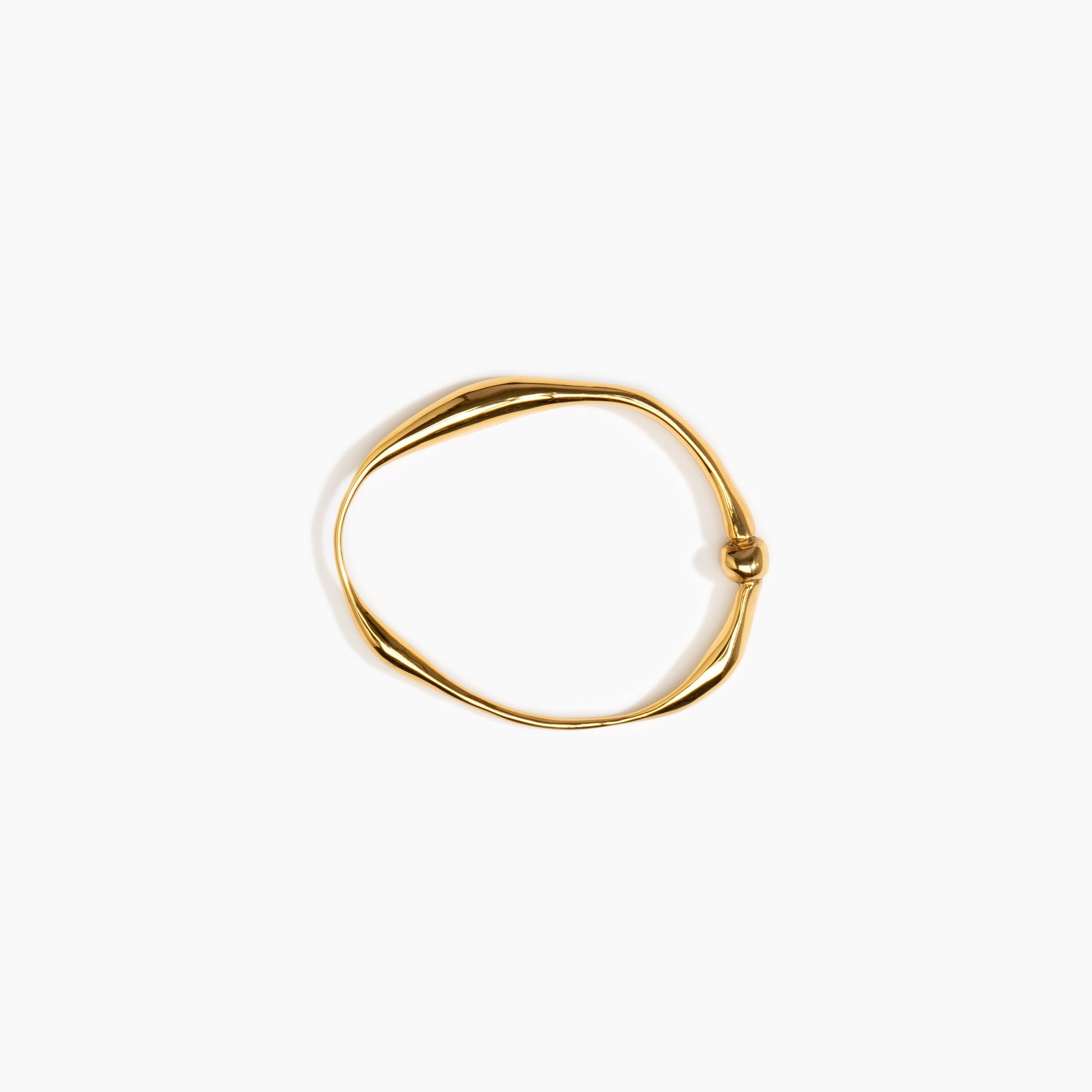 LO Collections Liquid Bangle in 24k Gold-Plated Brass Material..