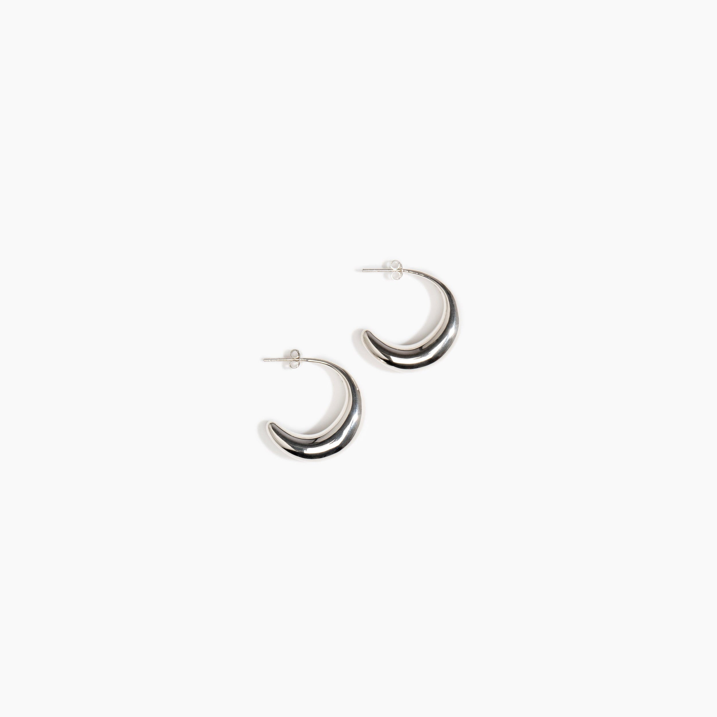 LO Collections Medium Liquid Hoop Earrings in 925 Sterling Silver Material..