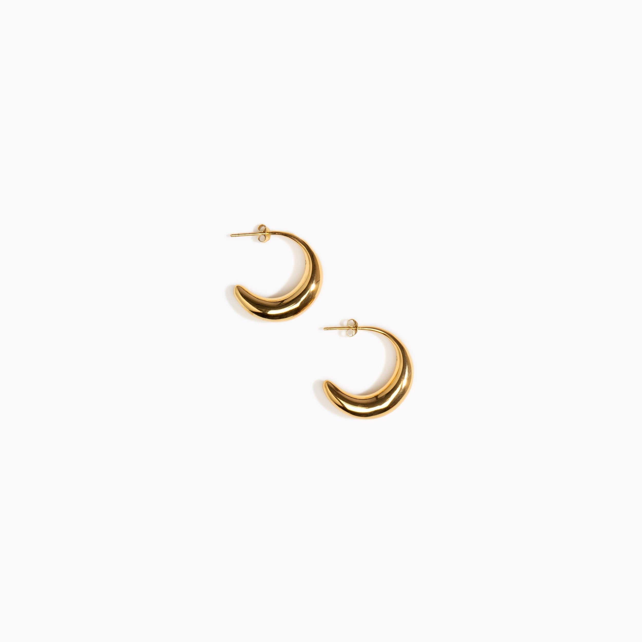 LO Collections Medium Liquid Hoop Earrings in 24k Gold-Plated Brass Material..