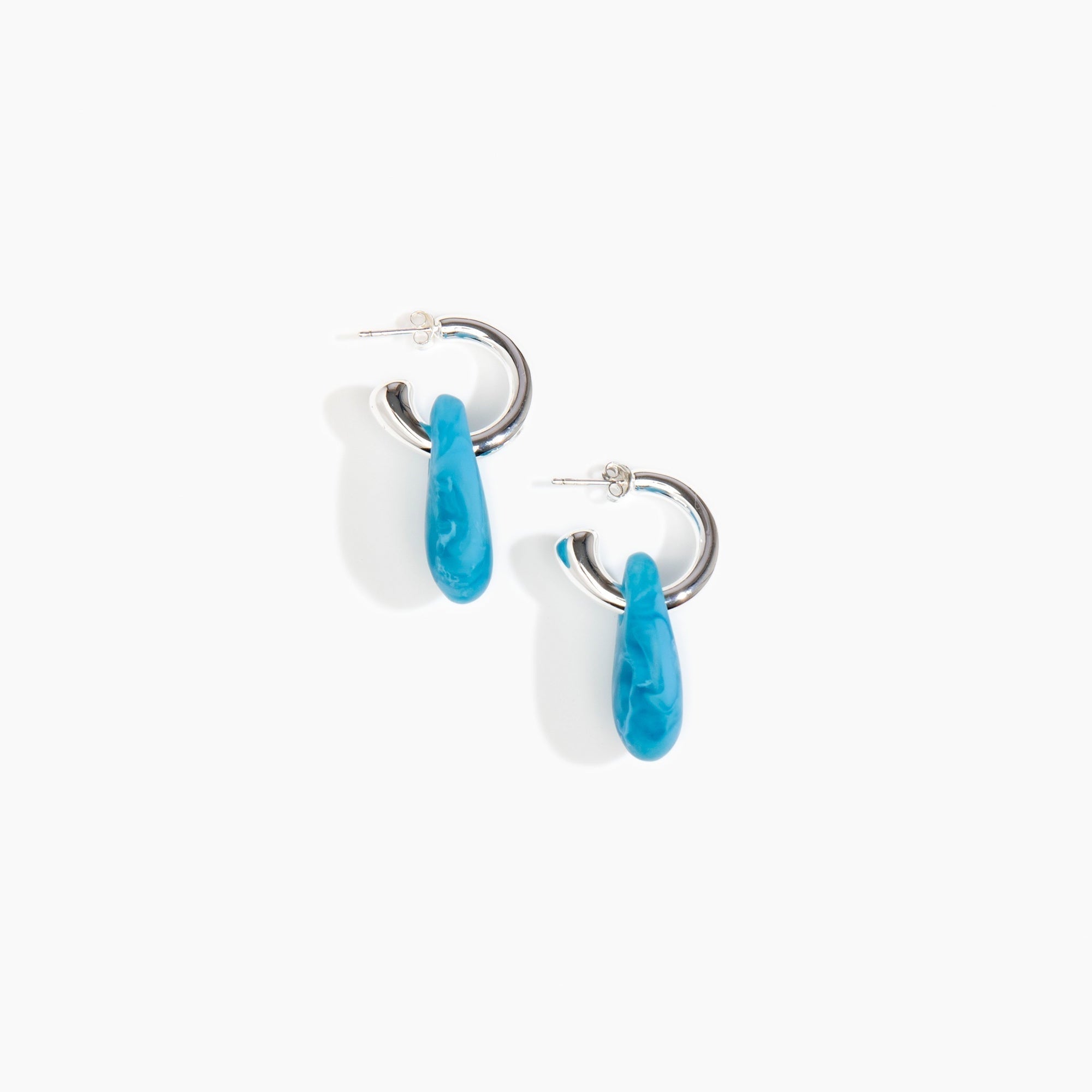 Dinosaur Designs Small Rock Hoop Earrings in Sky Colour resin with Silver-Plated Brass Hoop Material.