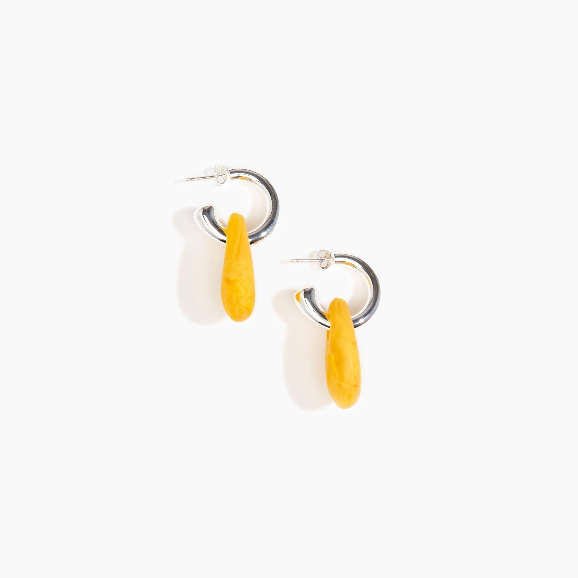 Dinosaur Designs Small Rock Hoop Earrings in Honeycomb Colour resin with Silver-Plated Brass Hoop Material.