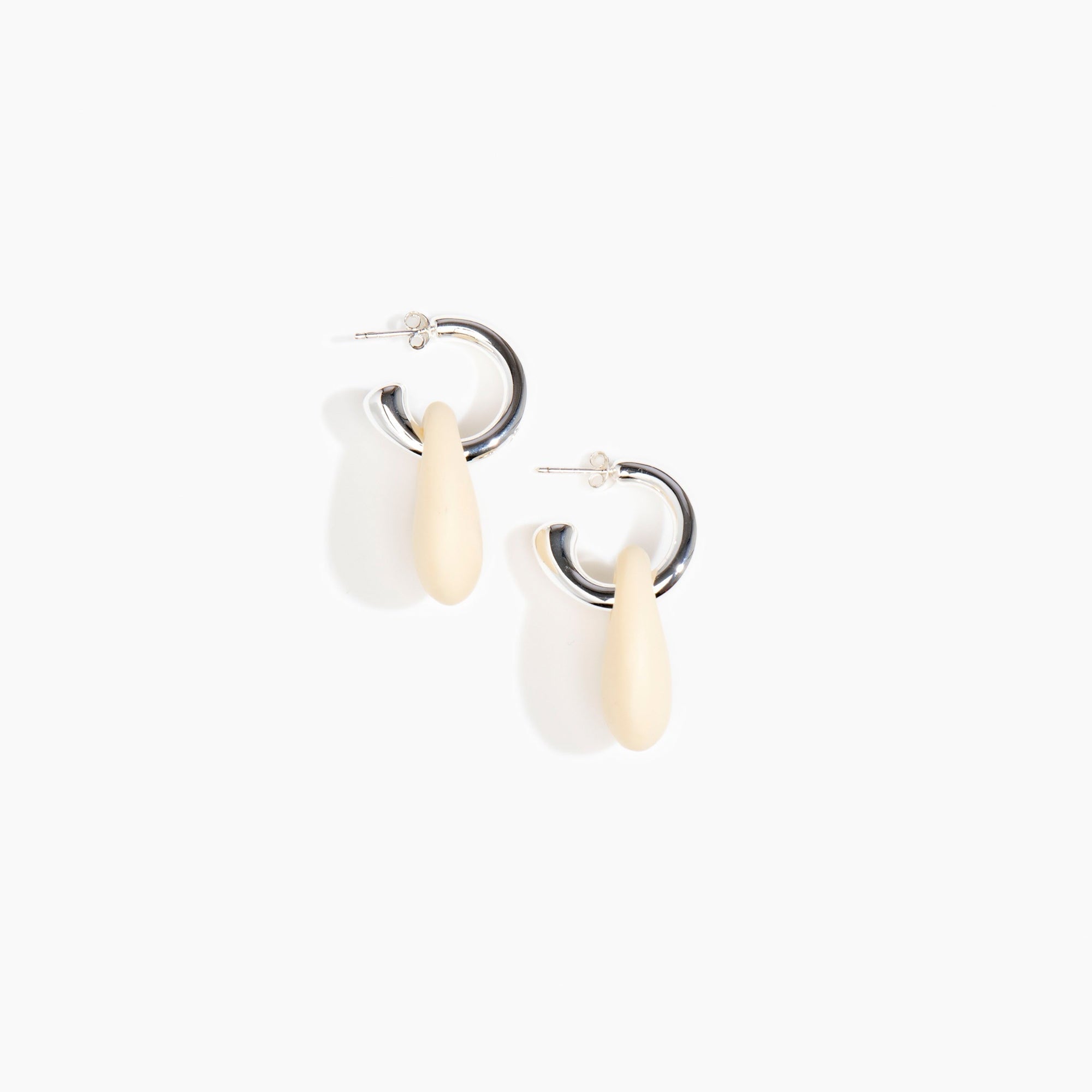 Dinosaur Designs Small Rock Hoop Earrings in Cream Colour resin with Silver-Plated Brass Hoop Material.