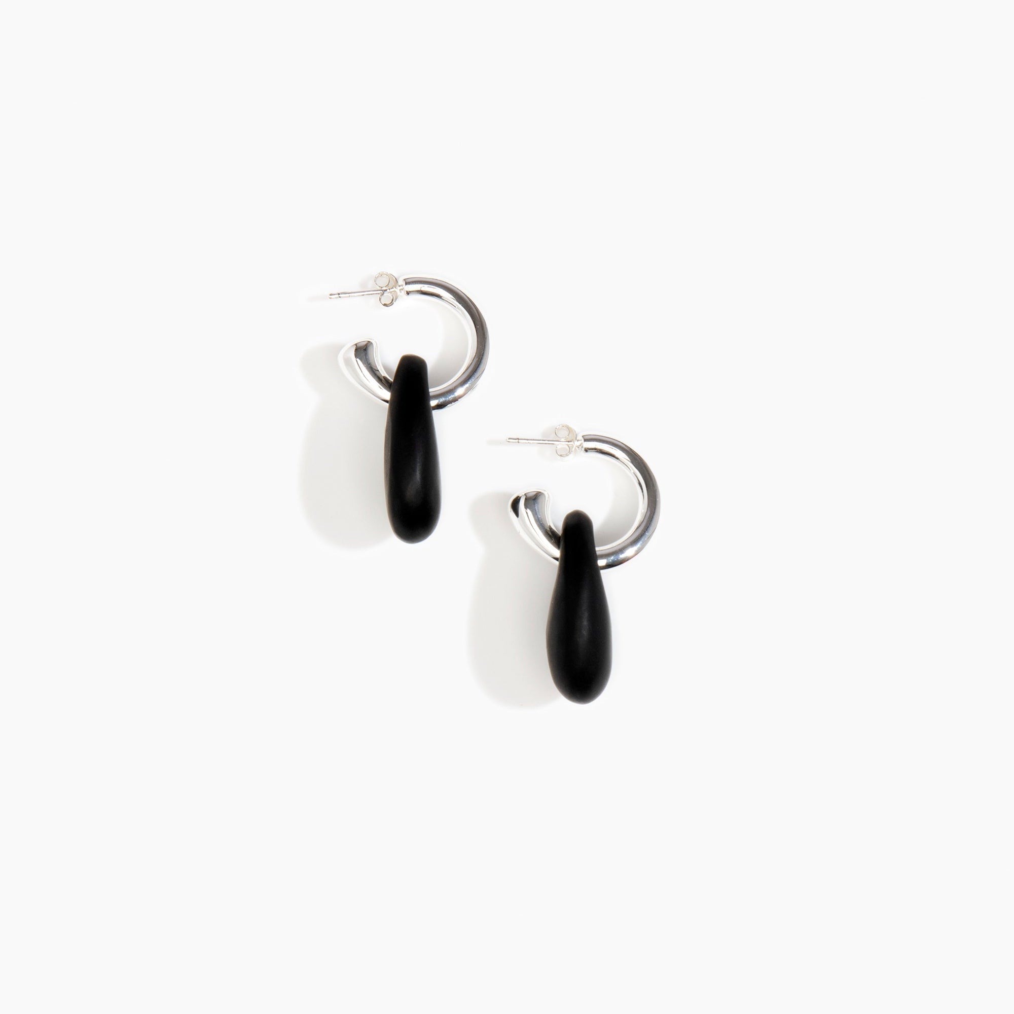 Dinosaur Designs Small Rock Hoop Earrings in Black Colour resin with Silver-Plated Brass Hoop Material.