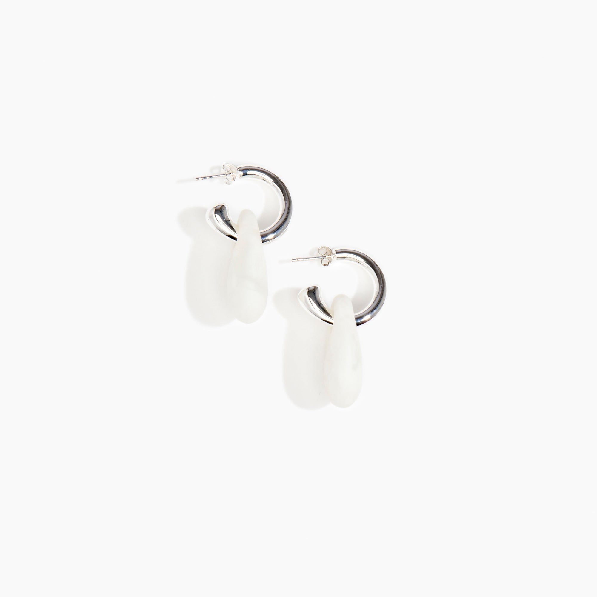 Dinosaur Designs Small Rock Hoop Earrings in Snow Swirl Colour resin with Silver-Plated Brass Hoop Material.