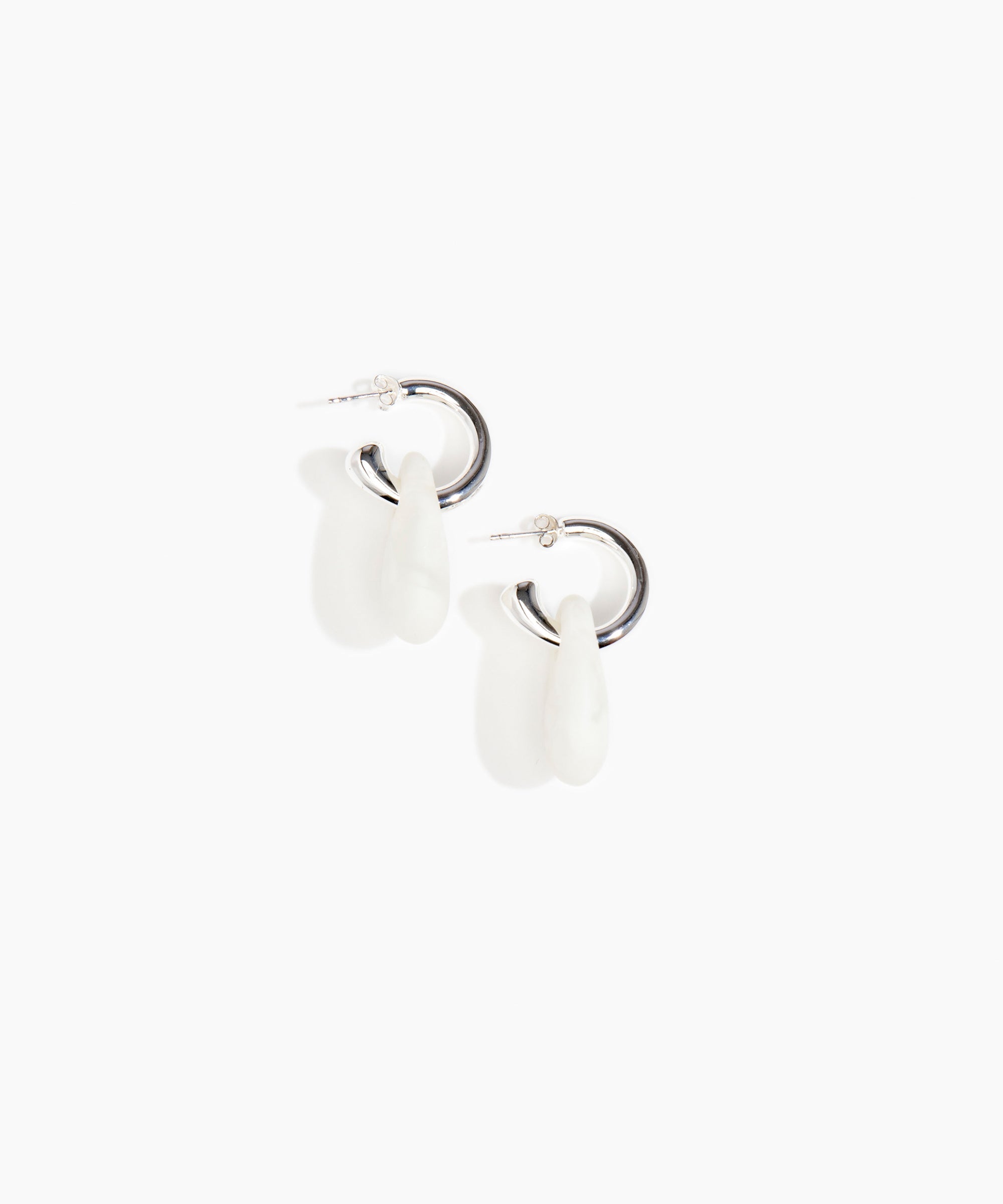 Dinosaur Designs Small Rock Hoop Earrings in Snow Swirl Colour resin with Silver-Plated Brass Hoop Material.