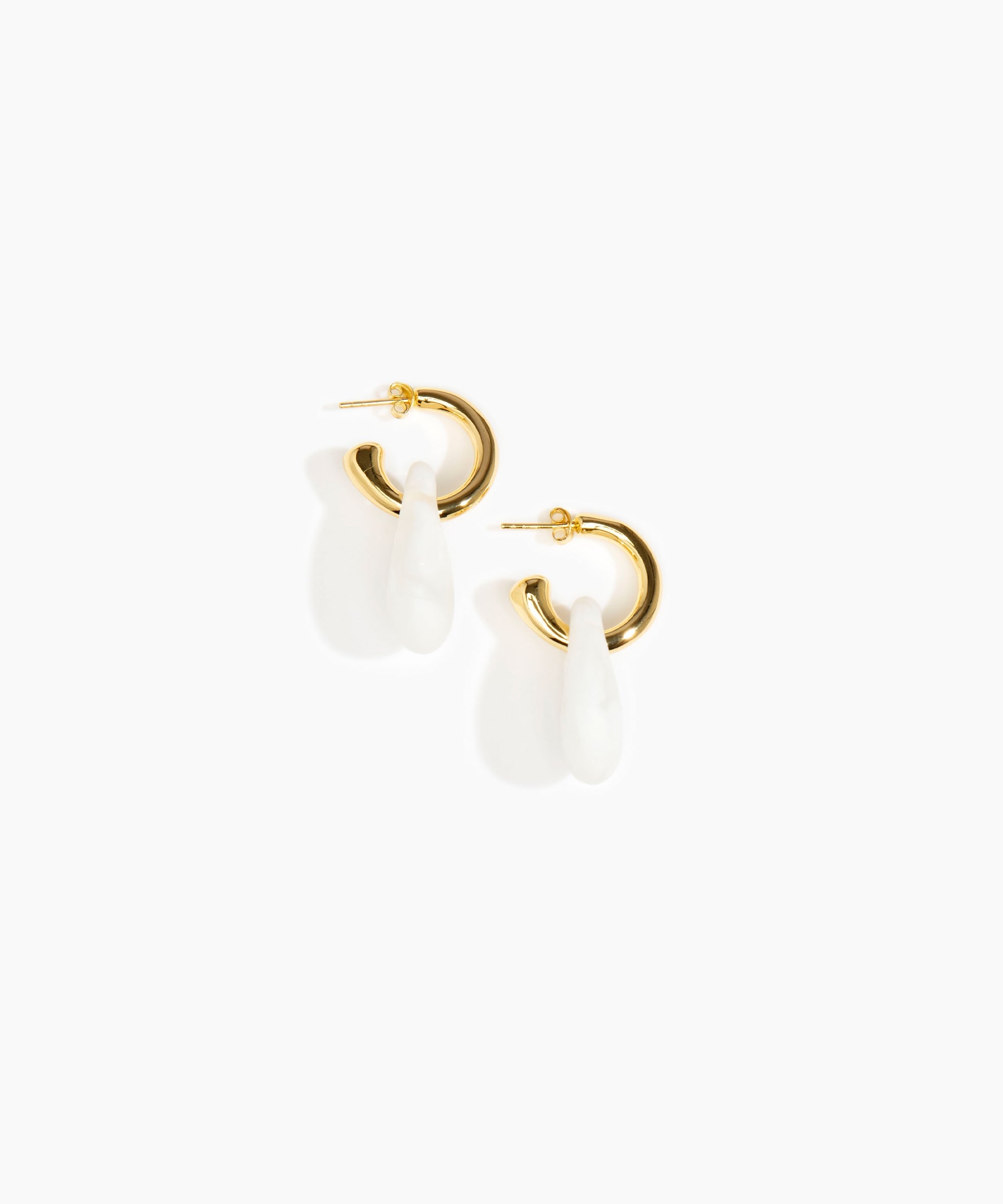 Dinosaur Designs Small Rock Hoop Earrings in Snow Swirl Colour resin with Brass Hoop Material..