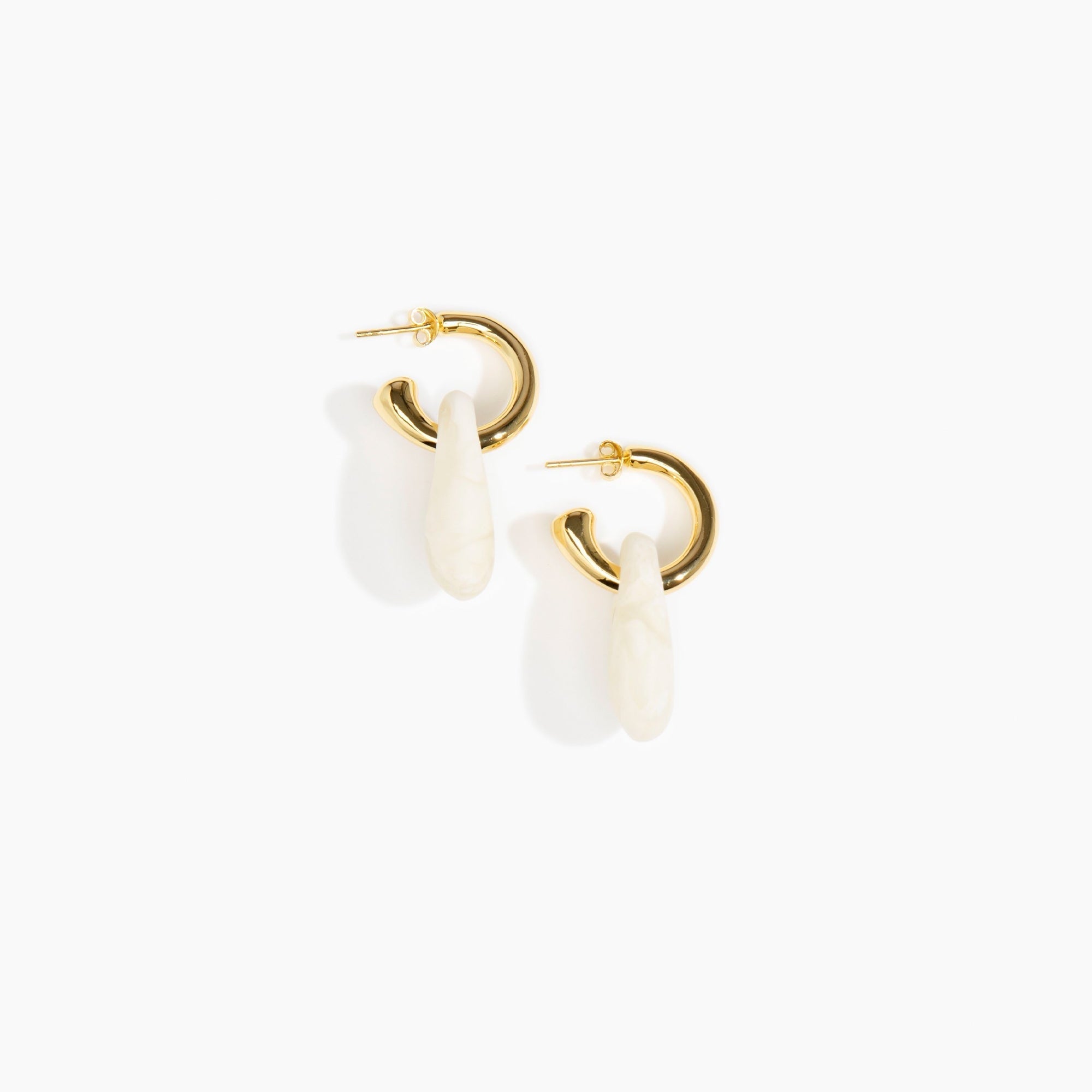 Dinosaur Designs Small Rock Hoop Earrings in Chalk Swirl Colour resin with Brass Hoop Material.