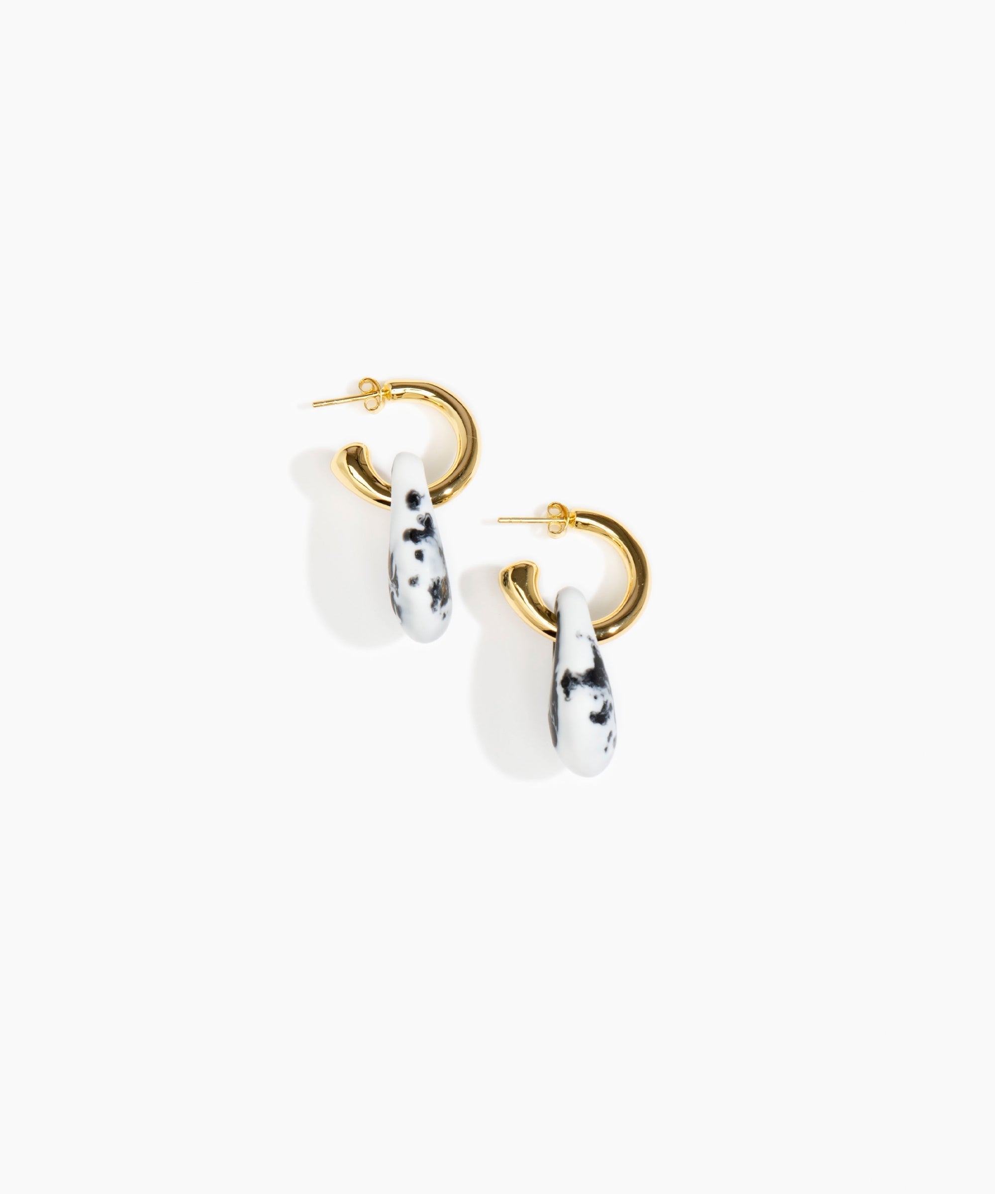 Dinosaur Designs Small Rock Hoop Earrings in White Marble Colour resin with Brass Hoop Material.