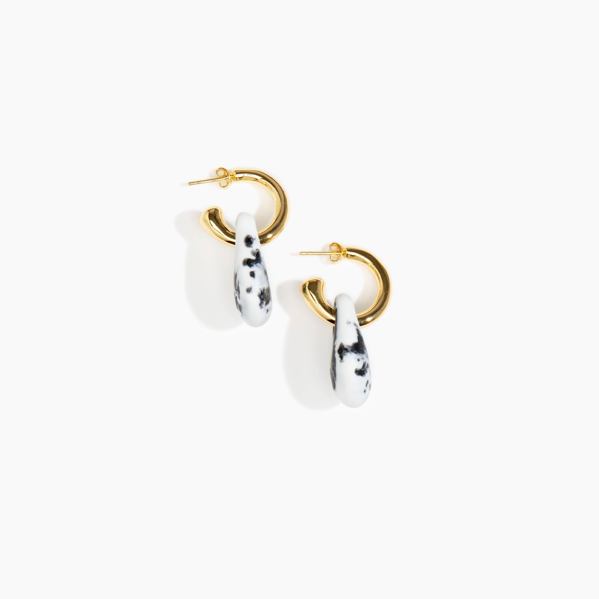 Dinosaur Designs Small Rock Hoop Earrings in White Marble Colour resin with Brass Hoop Material.