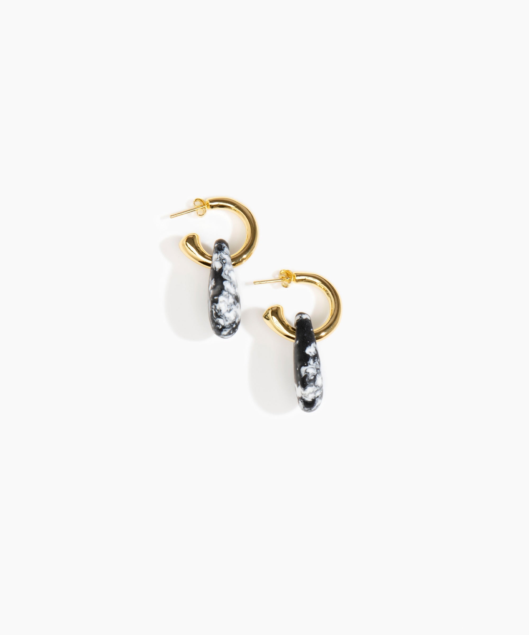 Dinosaur Designs Small Rock Hoop Earrings in Black Marble Colour resin with Brass Hoop Material.