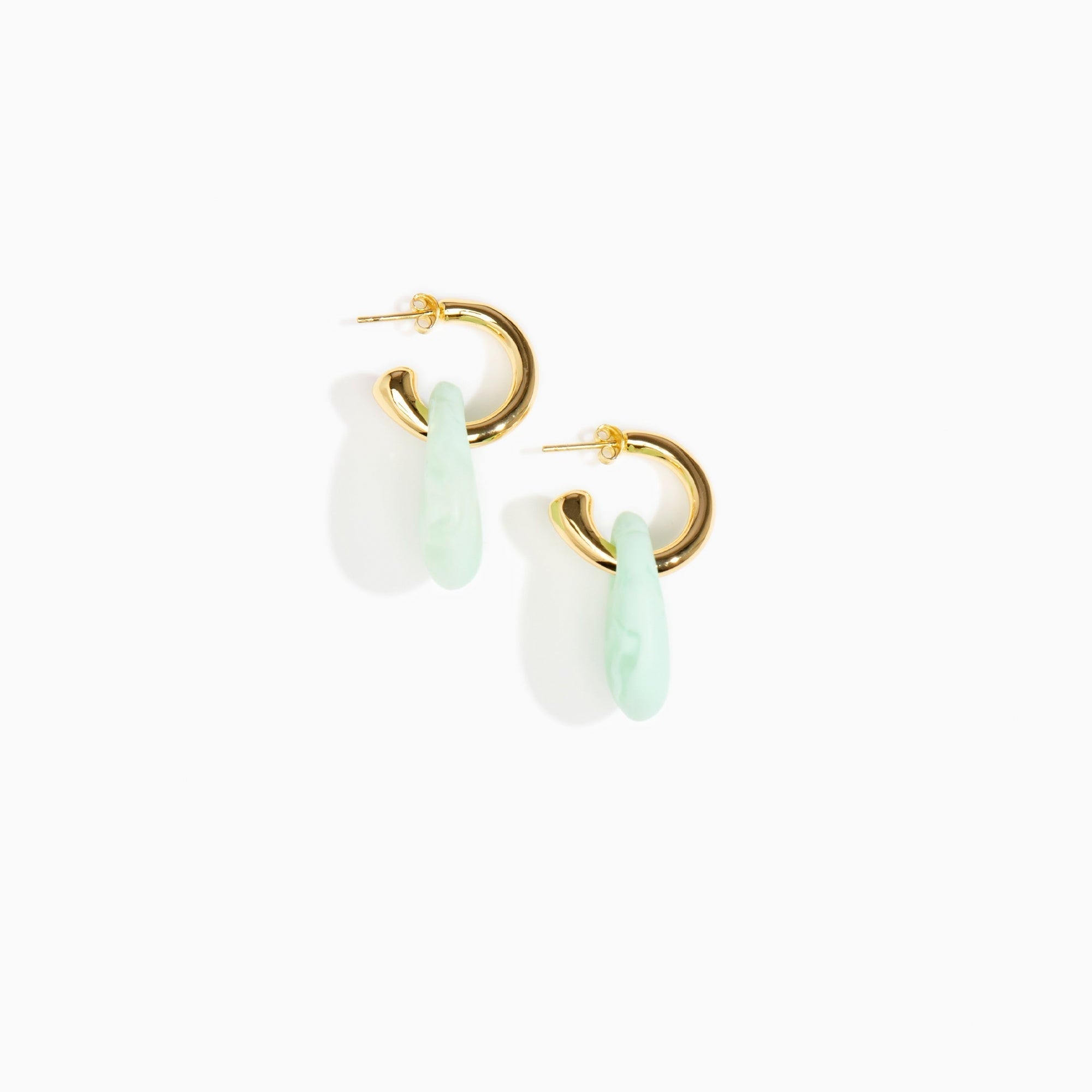 Dinosaur Designs Small Rock Hoop Earrings in Mint Colour resin with Brass Hoop Material.