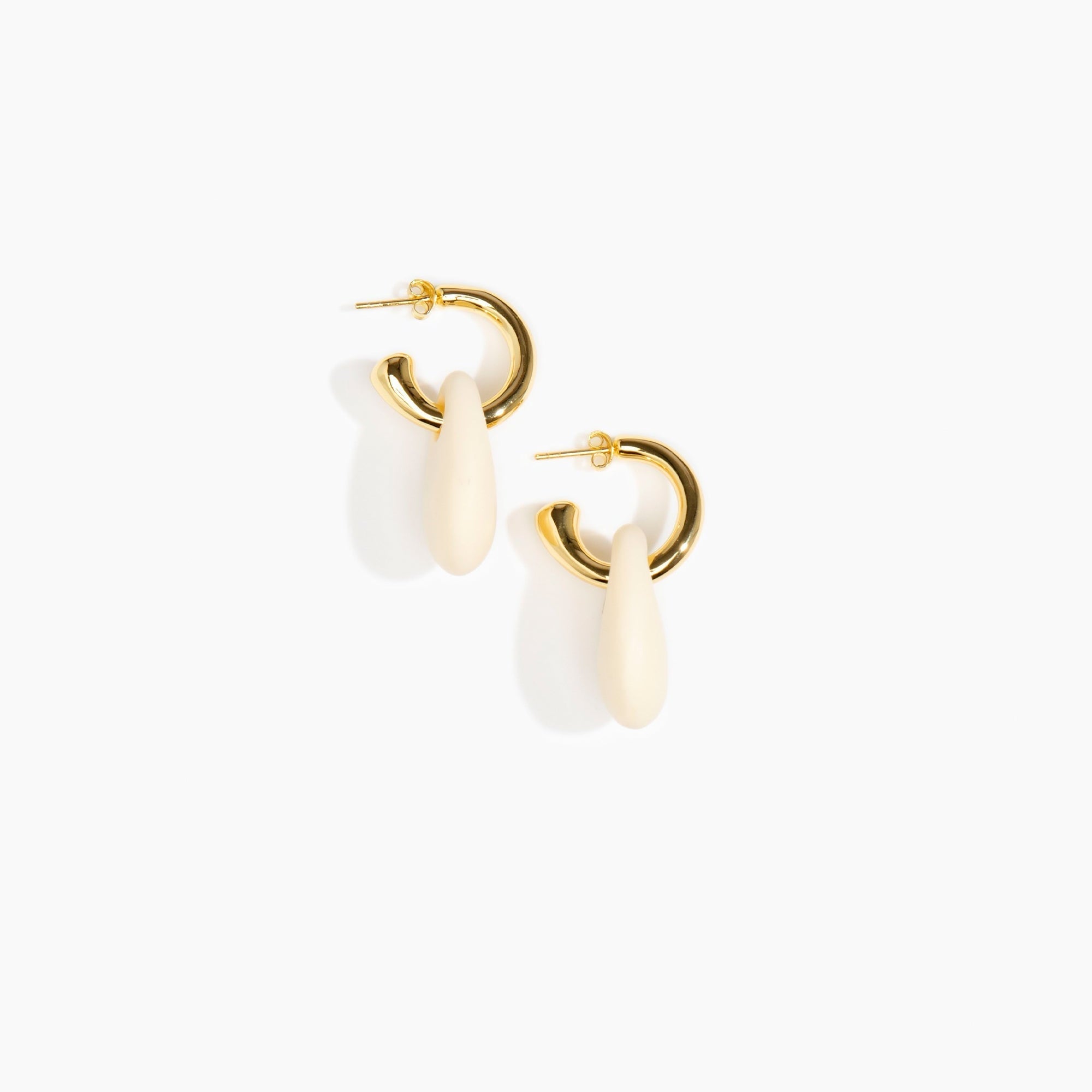Dinosaur Designs Small Rock Hoop Earrings in Cream Colour resin with Brass Hoop Material.