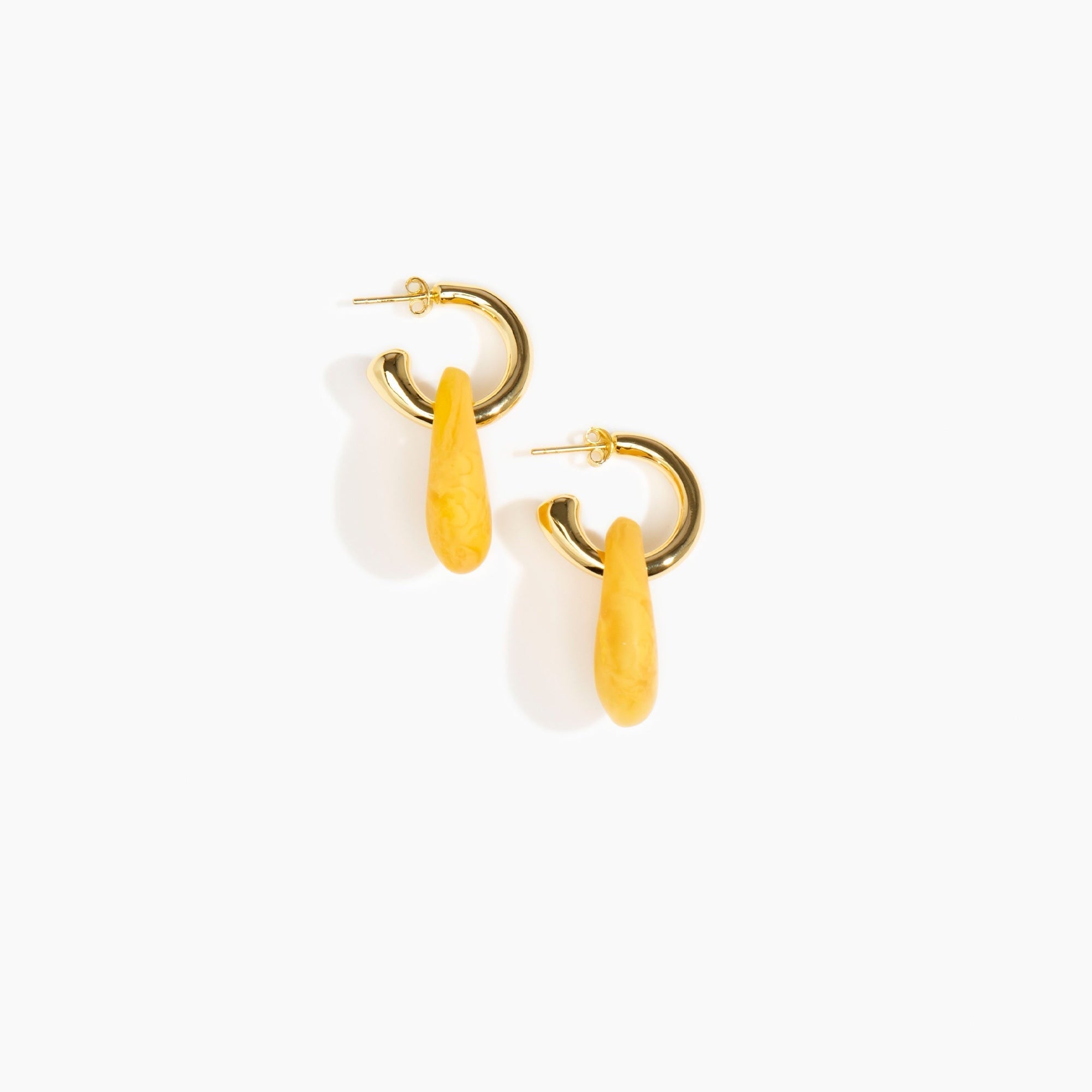 Dinosaur Designs Small Rock Hoop Earrings in Honeycomb Colour resin with Brass Hoop Material.