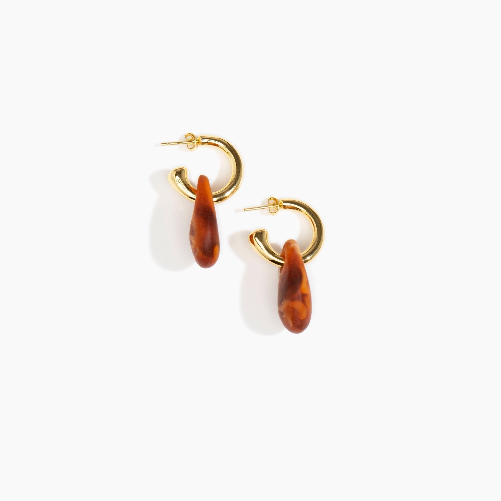 Dinosaur Designs Small Rock Hoop Earrings in Dark Horn Colour resin with Brass Hoop Material.