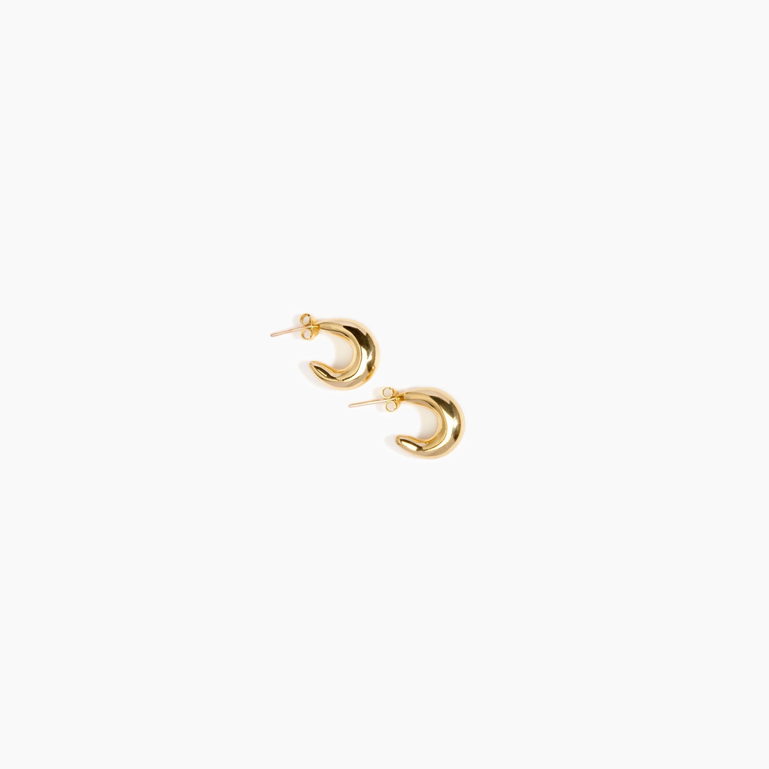 LO Collections Medium Liquid Loop Earrings in Nano-Coated Brass Material..