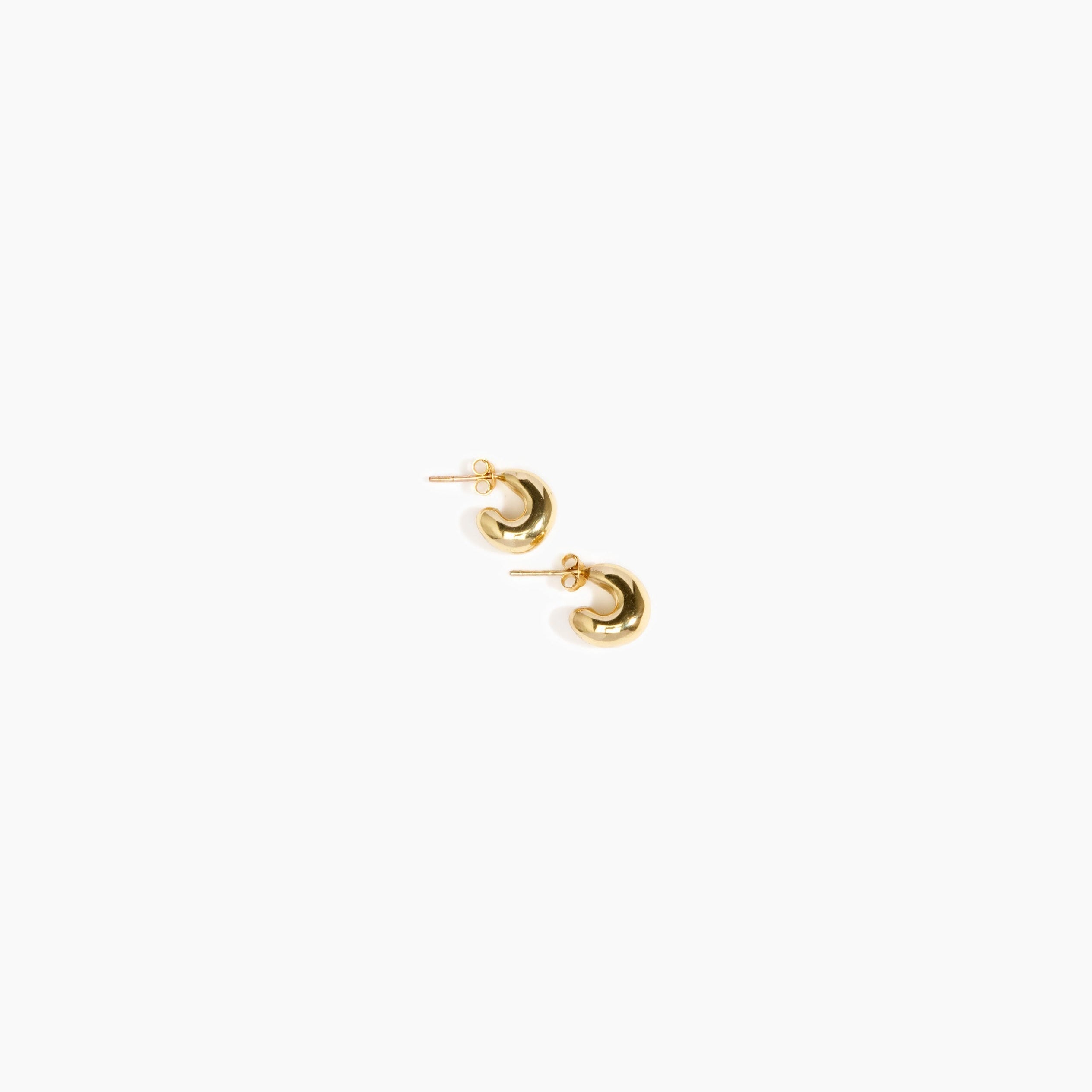 LO Collections Small Liquid Loop Earrings in Nano-Coated Brass Material..