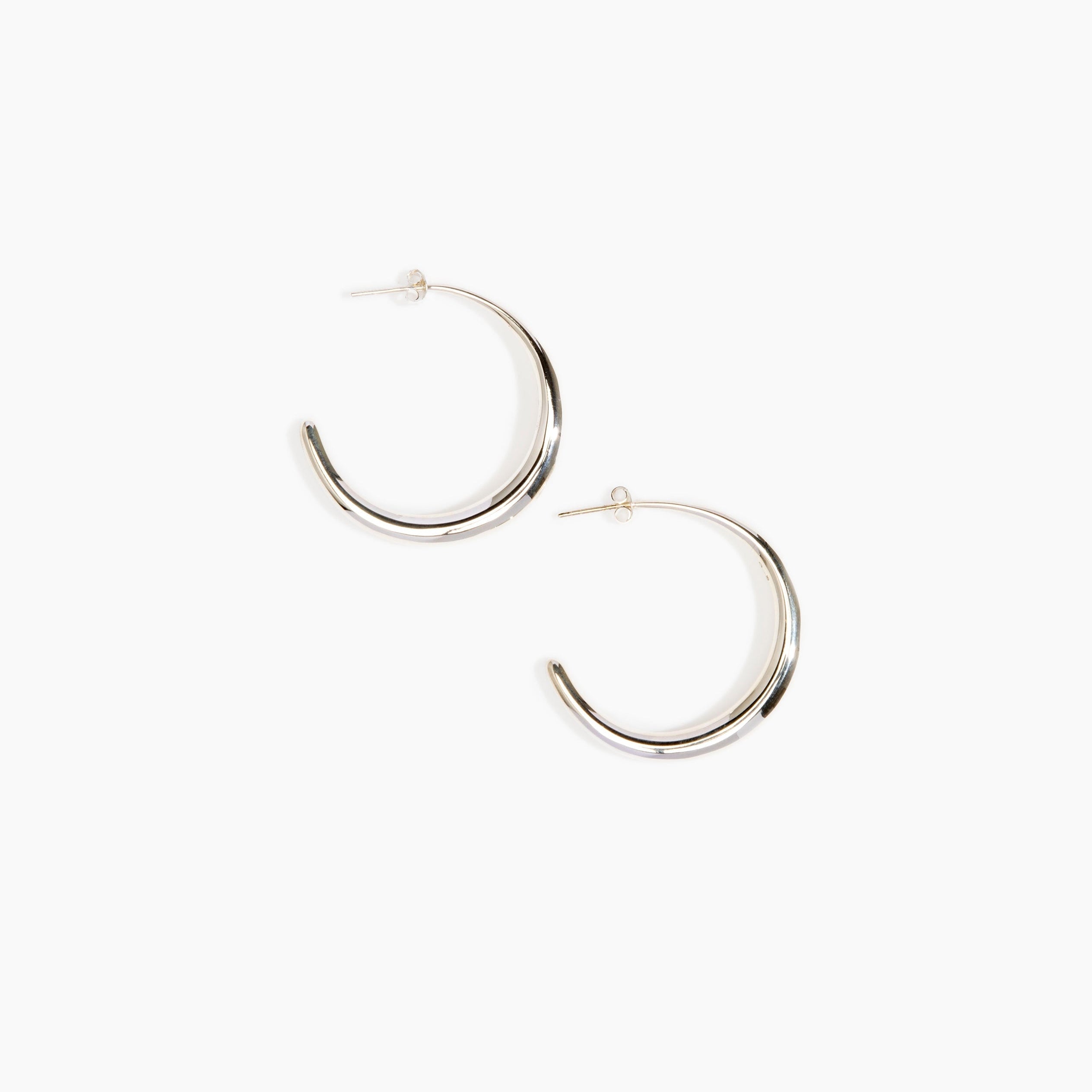LO Collections Large Liquid Hoop Earrings in 925 Sterling Silver Material..