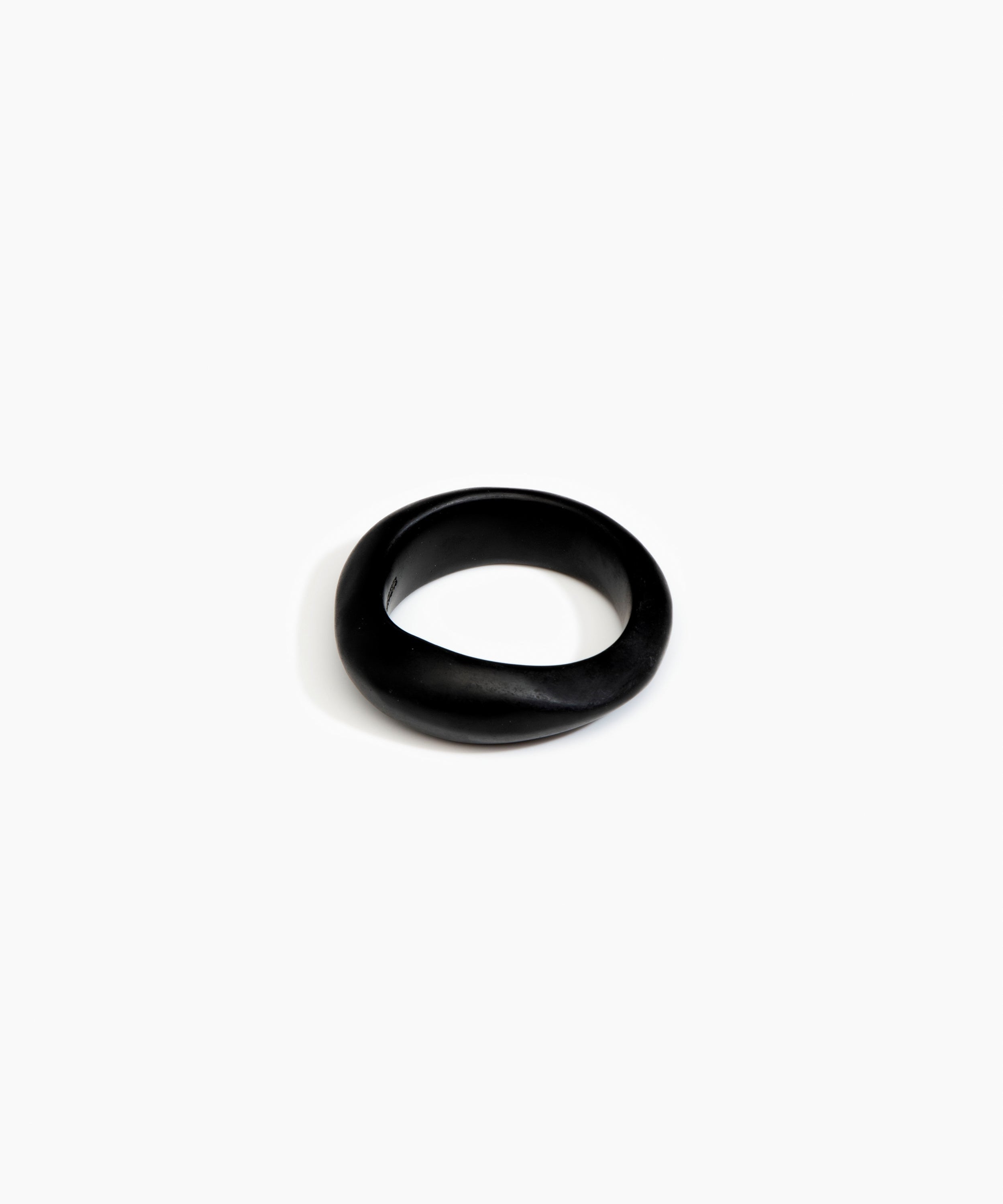 Dinosaur Designs Earth Bangle in Black Colour resin with Regular Fit.