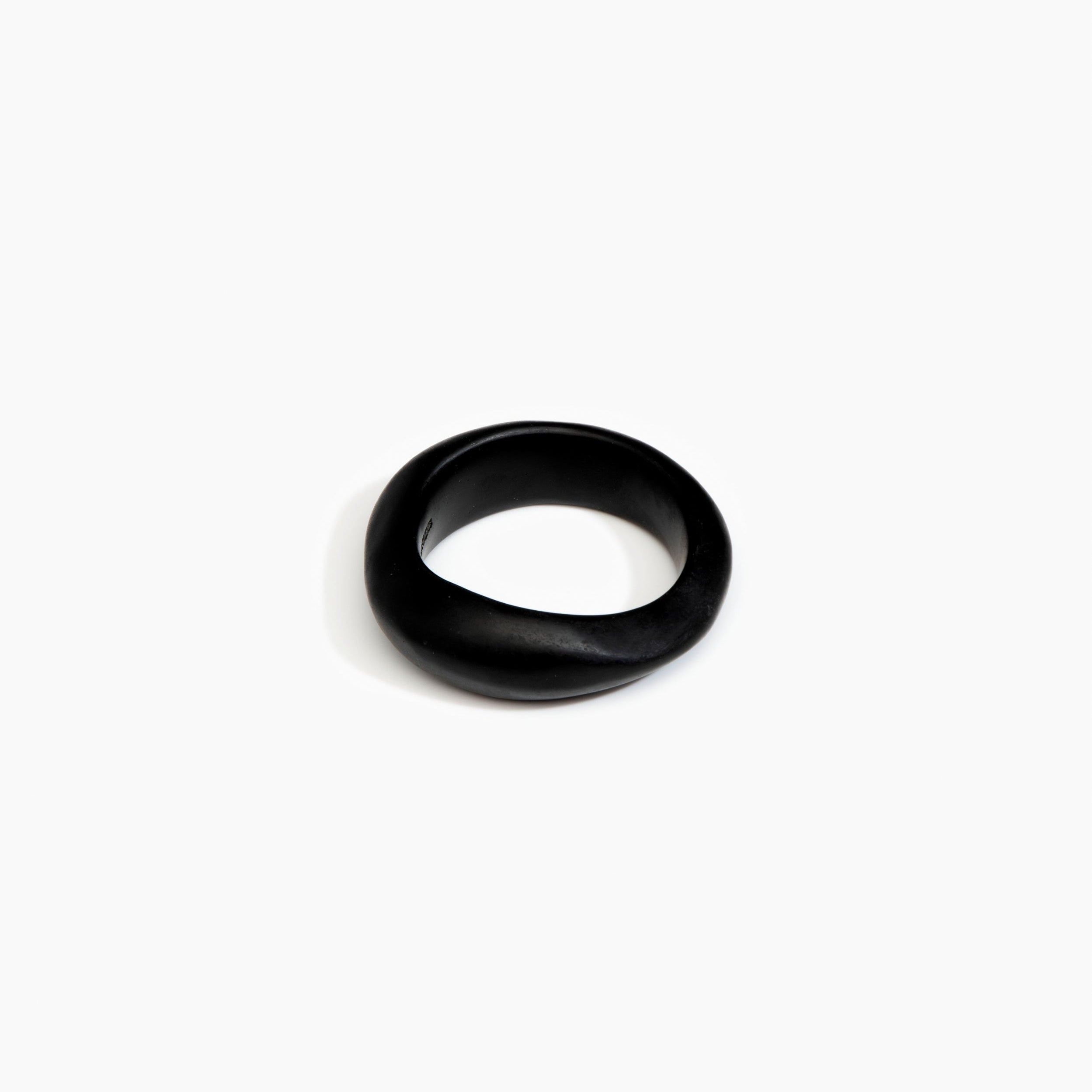 Dinosaur Designs Earth Bangle in Black Colour resin with Regular Fit..