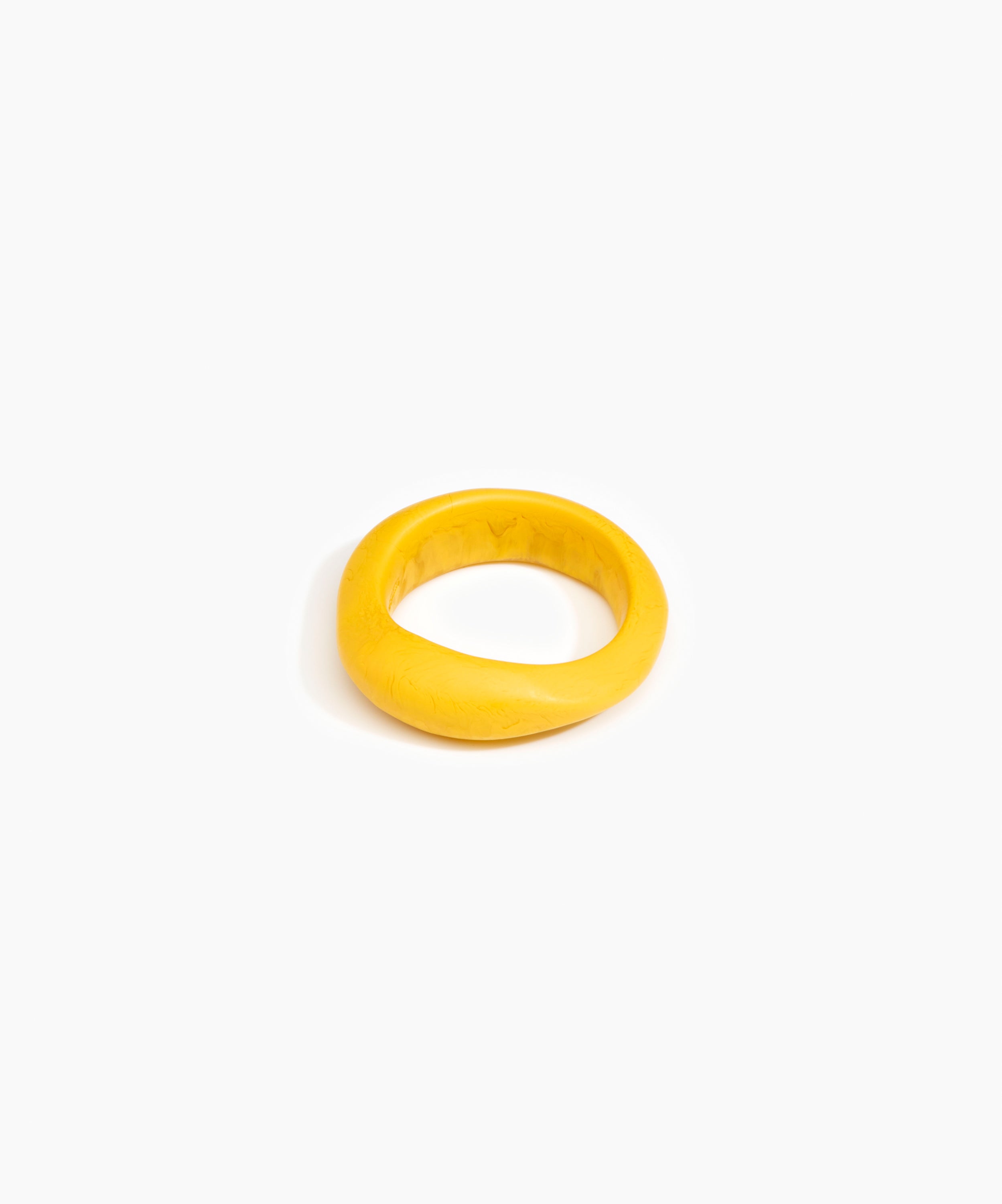 Dinosaur Designs Earth Bangle in Honeycomb Colour resin with Regular Fit.