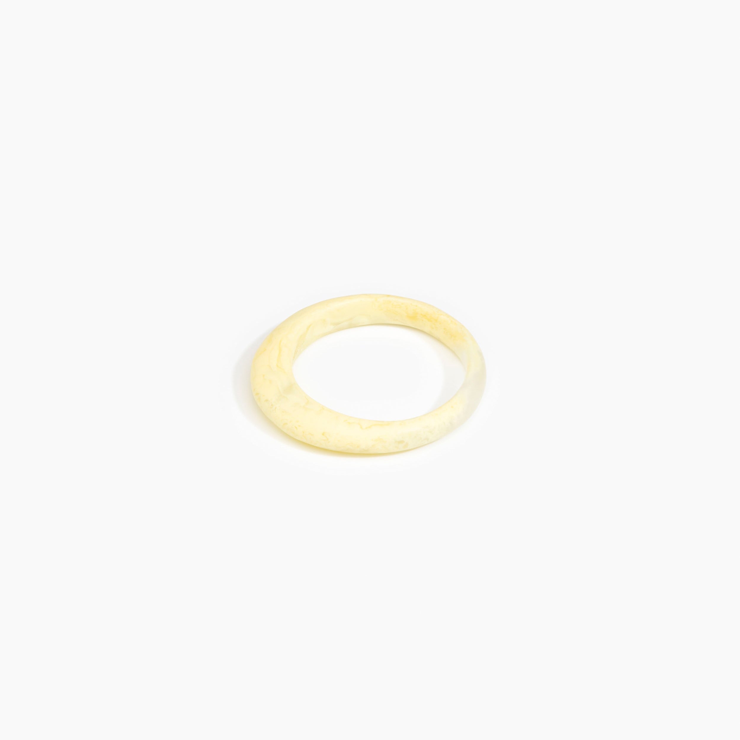 Dinosaur Designs Small Organic Bangle in Lemon Colour resin with Regular Fit.