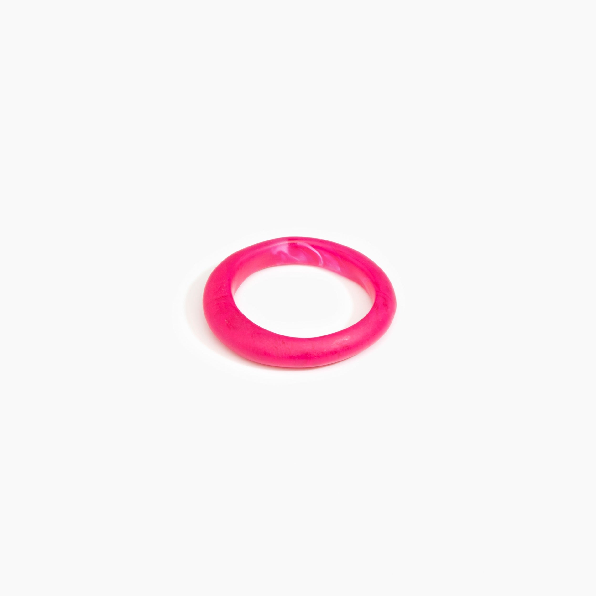 Dinosaur Designs Small Organic Bangle in Flamingo Colour resin with Regular Fit.