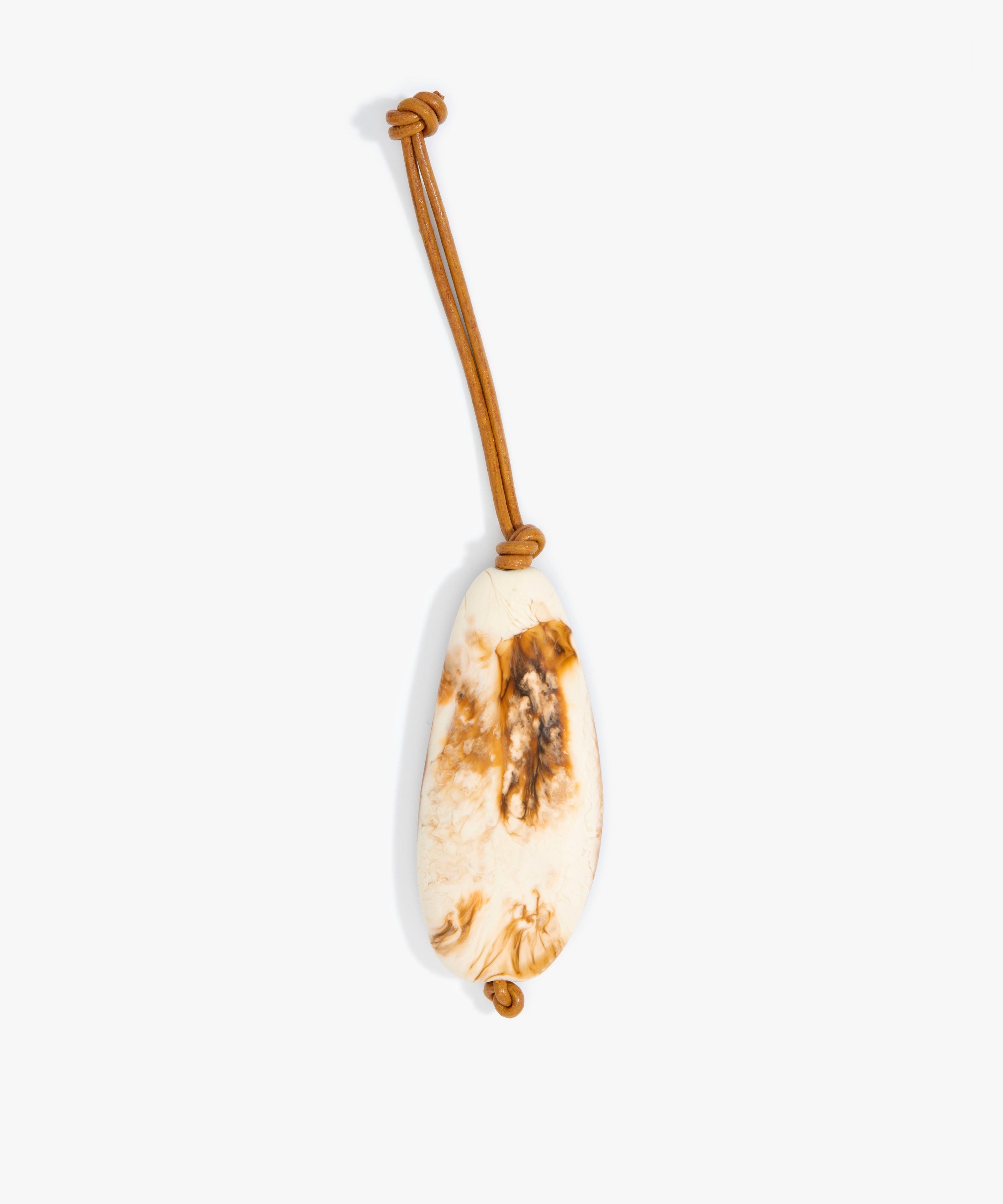 Dinosaur Designs Pebble Keyring in Light Horn Colour resin