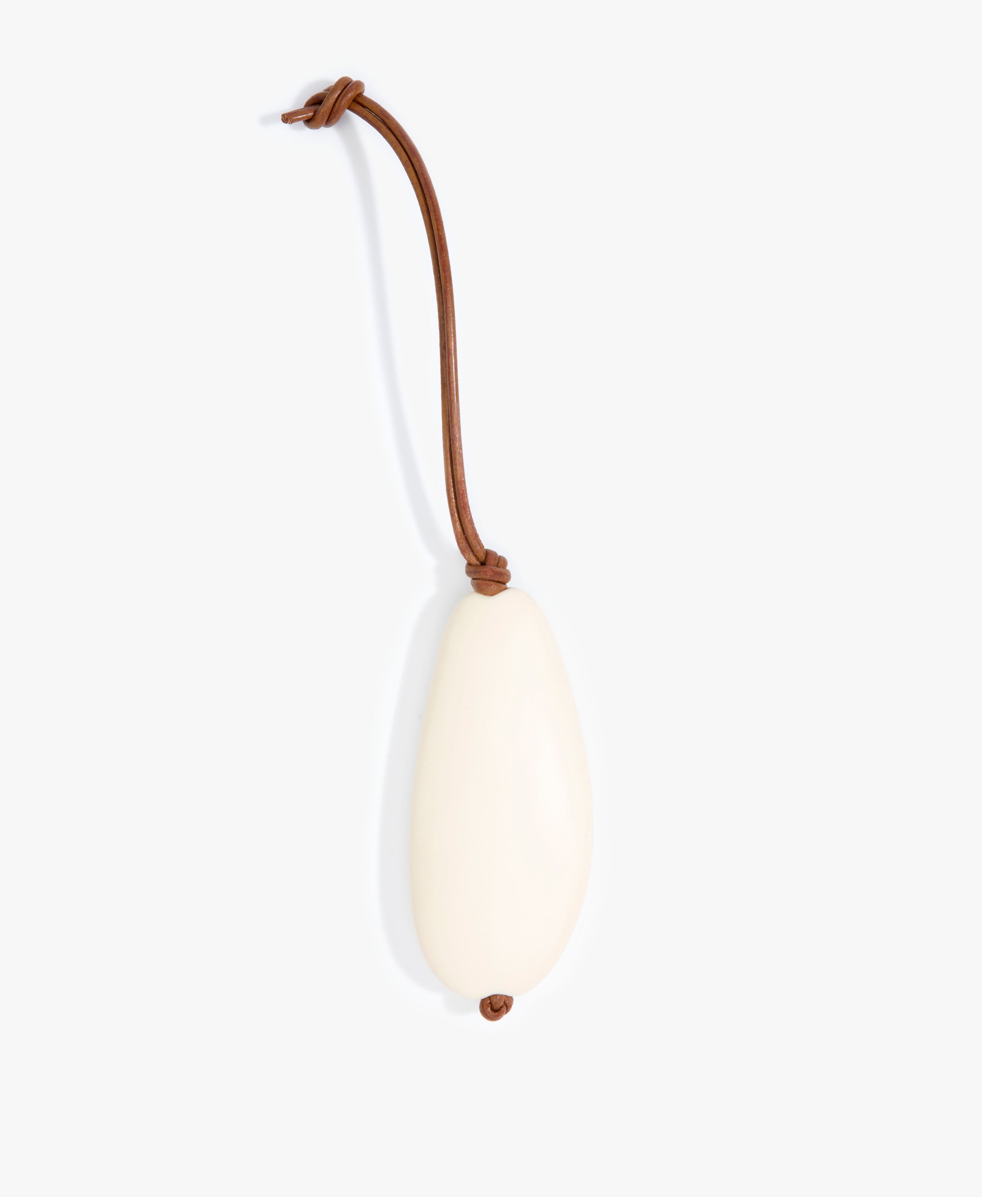 Dinosaur Designs Pebble Keyring in Cream Colour resin