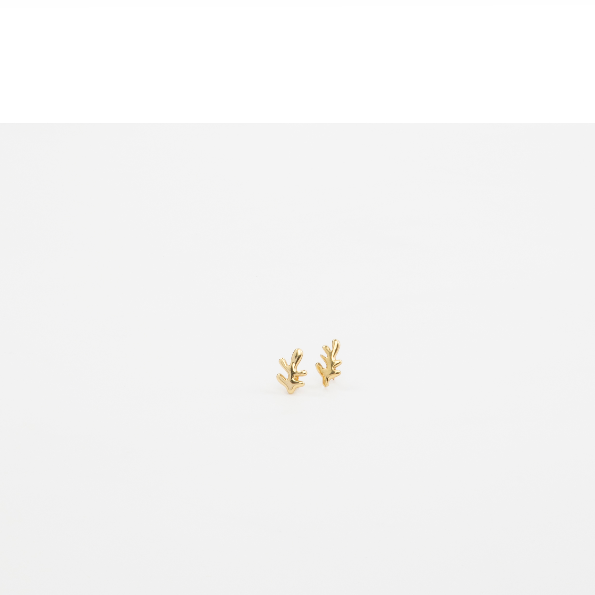 LO Collections Leaf Stud Earrings in Nano-Coated Brass Material..