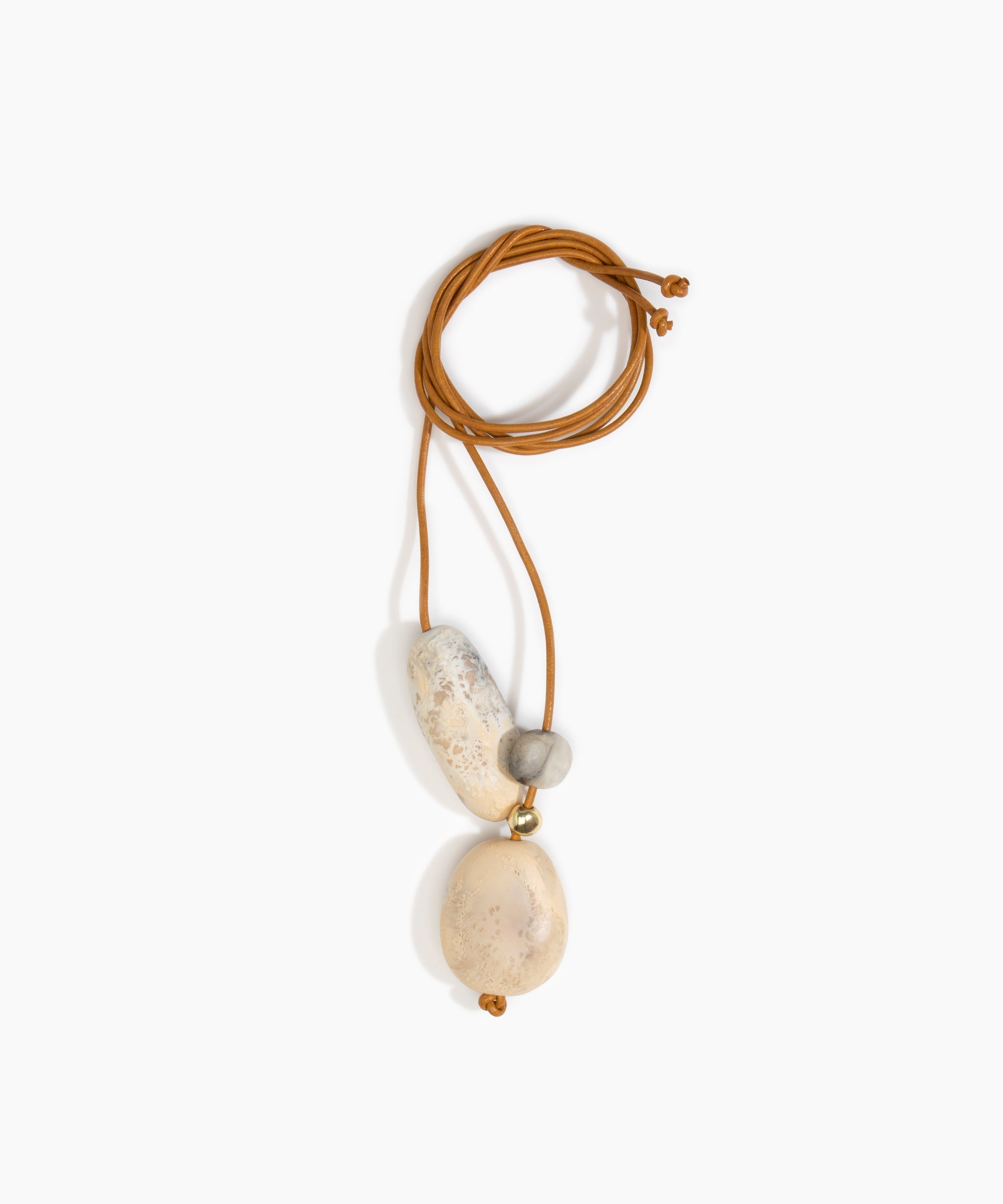 Dinosaur Designs Rock Cluster Pendant in Sandy Pearl Colour resin with Nano-Coated Brass Bead Material.