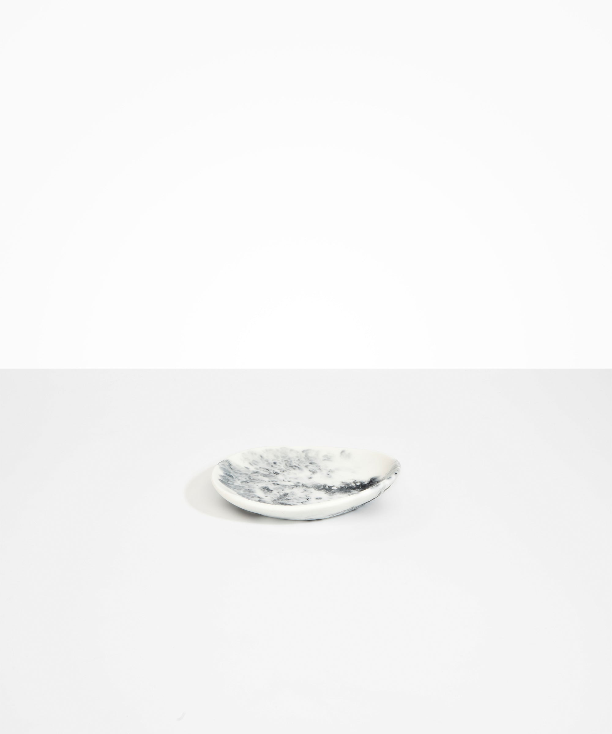 Dinosaur Designs Pebble Side Plate in White Marble Colour resin.