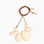 Dinosaur Designs Riverstone Choker Necklaces in Cream Colour resin with Brass Bead on Tan Leather Material