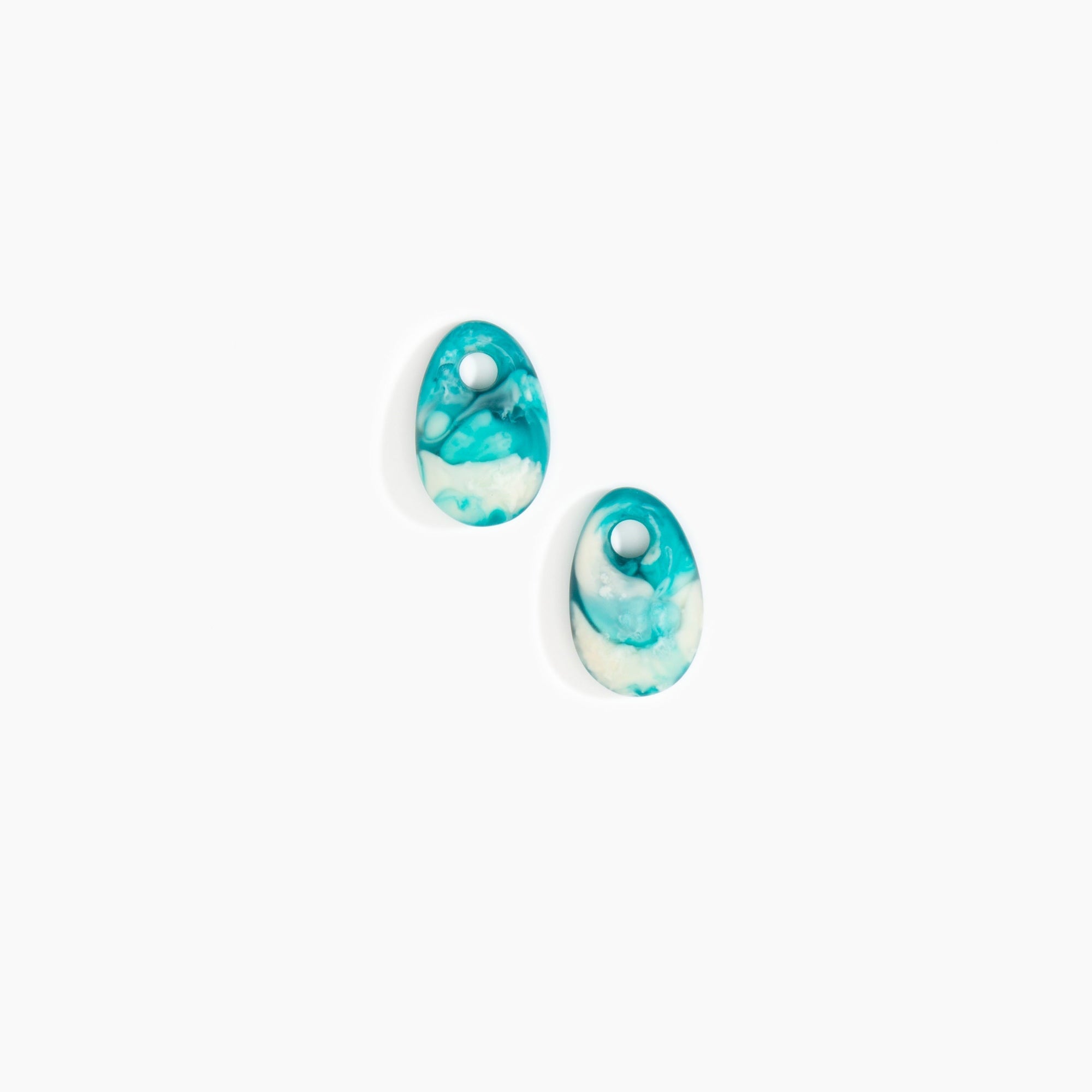 Dinosaur Designs Small Rock Beads in Lagoon Colour resin..