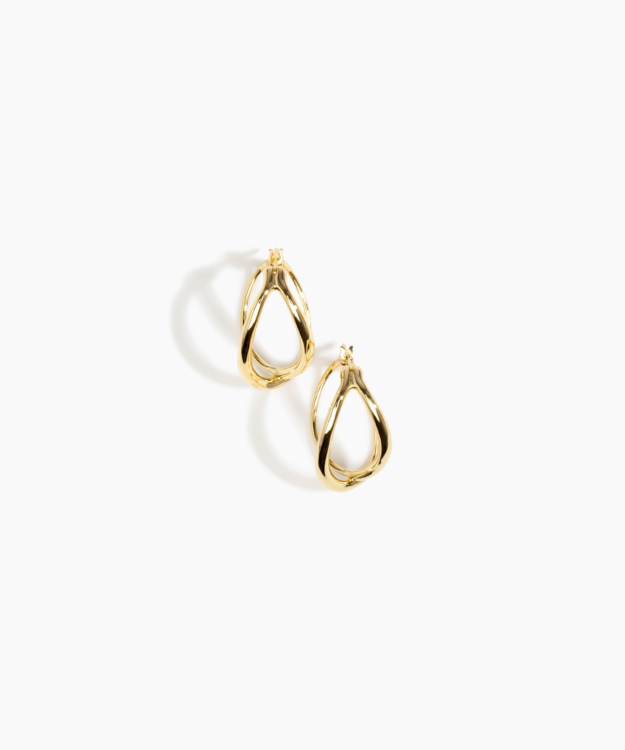 Dinosaur Designs and Alex & Trahanas Medium Corda Earrings in Brass — polished gold-toned brass hoop earrings with interlinked twisted loop design