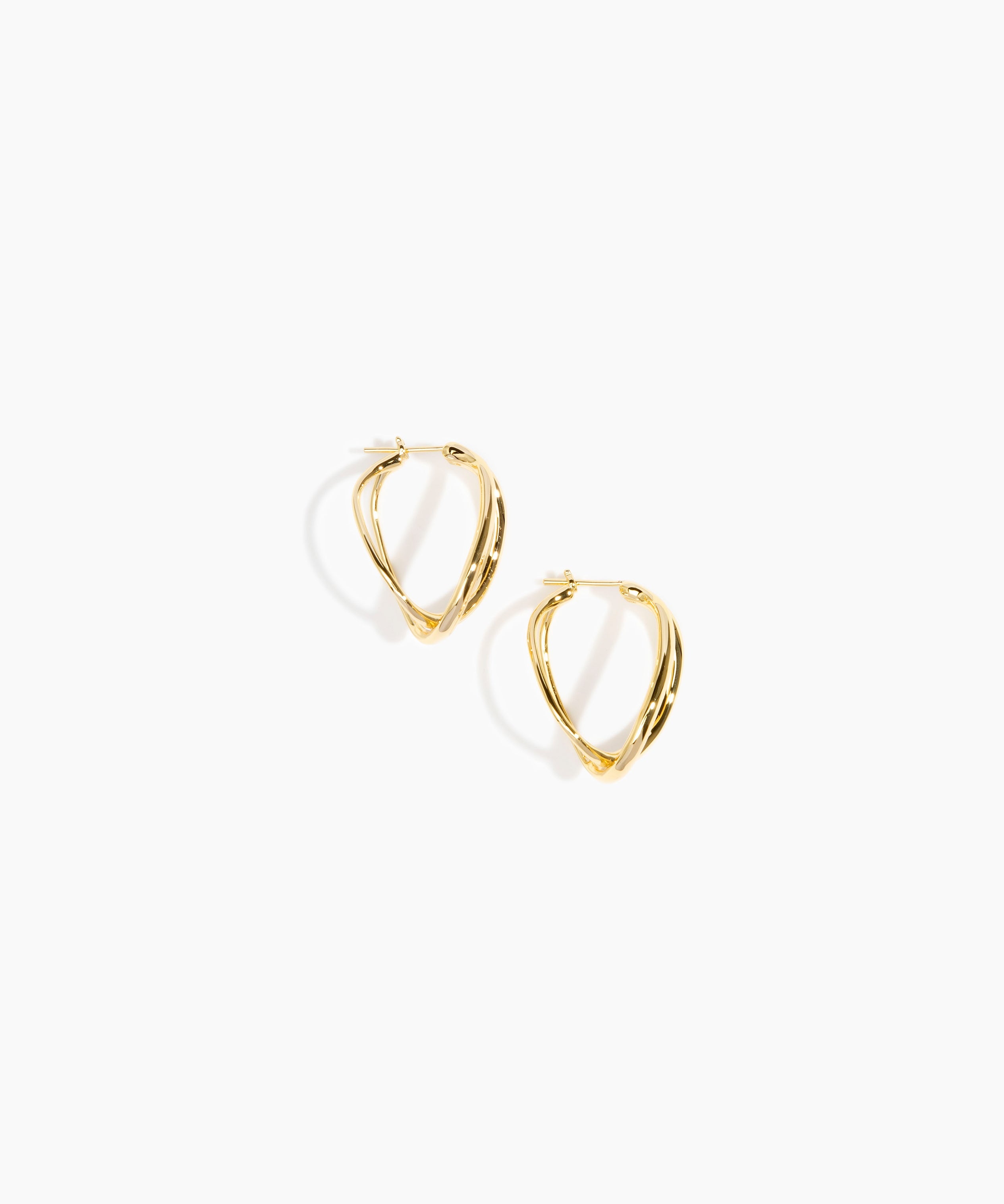 Dinosaur Designs and Alex & Trahanas Medium Corda Earrings in Brass — polished gold-toned brass hoop earrings with interlinked twisted loop design