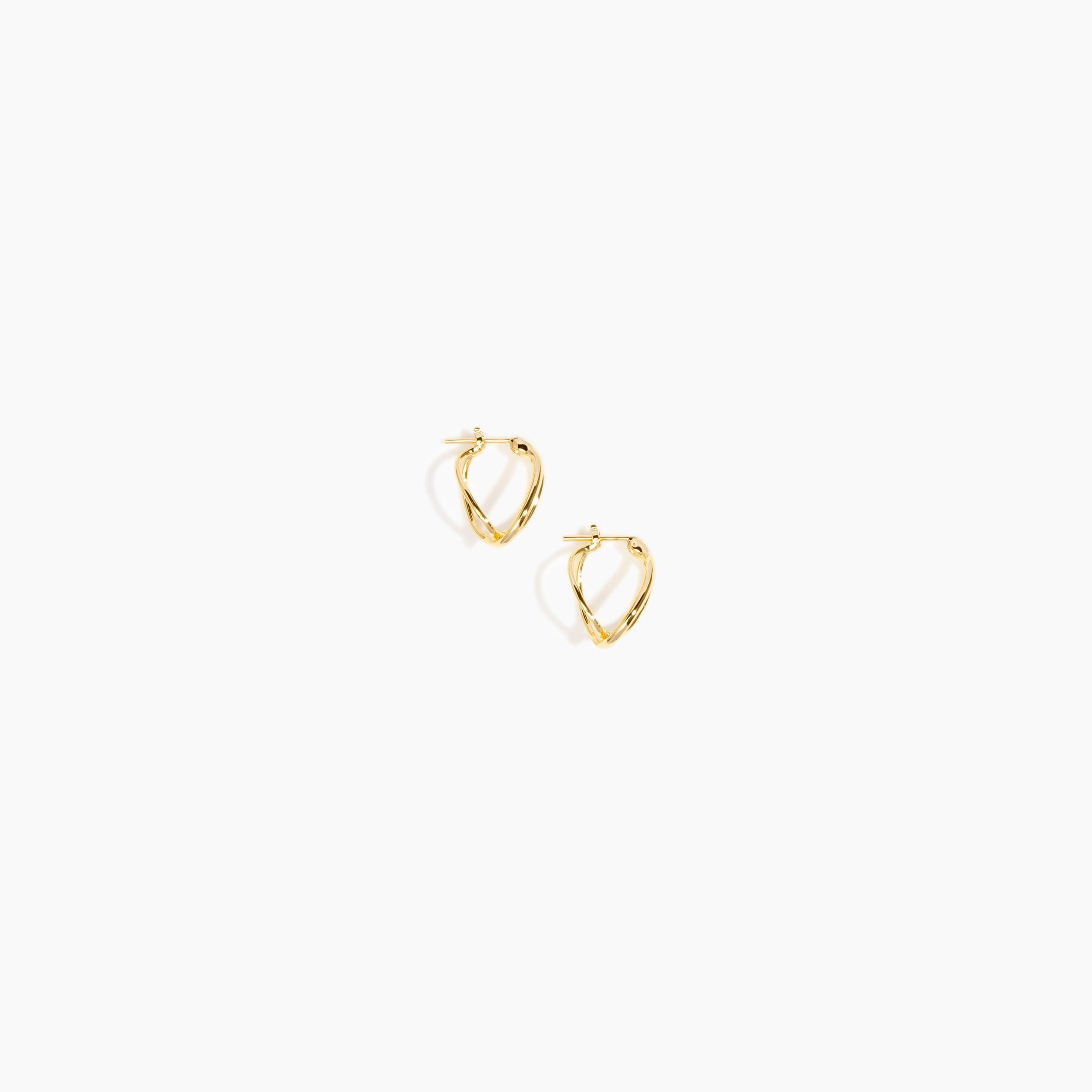 Dinosaur Designs and Alex & Trahanas Small Corda Earrings in Brass — polished gold-toned brass hoop earrings with interlinked twisted loop design..