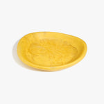 Dinosaur Designs Large Bones Bowl in Pollen — handmade marbled yellow resin shallow serving bowl with a rounded organic form