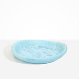 Dinosaur Designs Large Bones Bowl in Pool — handmade marbled blue resin shallow serving bowl with a rounded organic form
