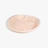 Dinosaur Designs Large Bones Bowl in Rose Swirl — handmade pink resin shallow serving bowl with a rounded organic form...