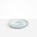 Dinosaur Designs Medium Bones Bowl in Cloud — mid sized handmade marbled cream and grey resin shallow serving bowl with a rounded organic form..
