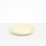 Dinosaur Designs Medium Bones Bowl in Cream — mid sized handmade cream resin shallow serving bowl with a rounded organic form