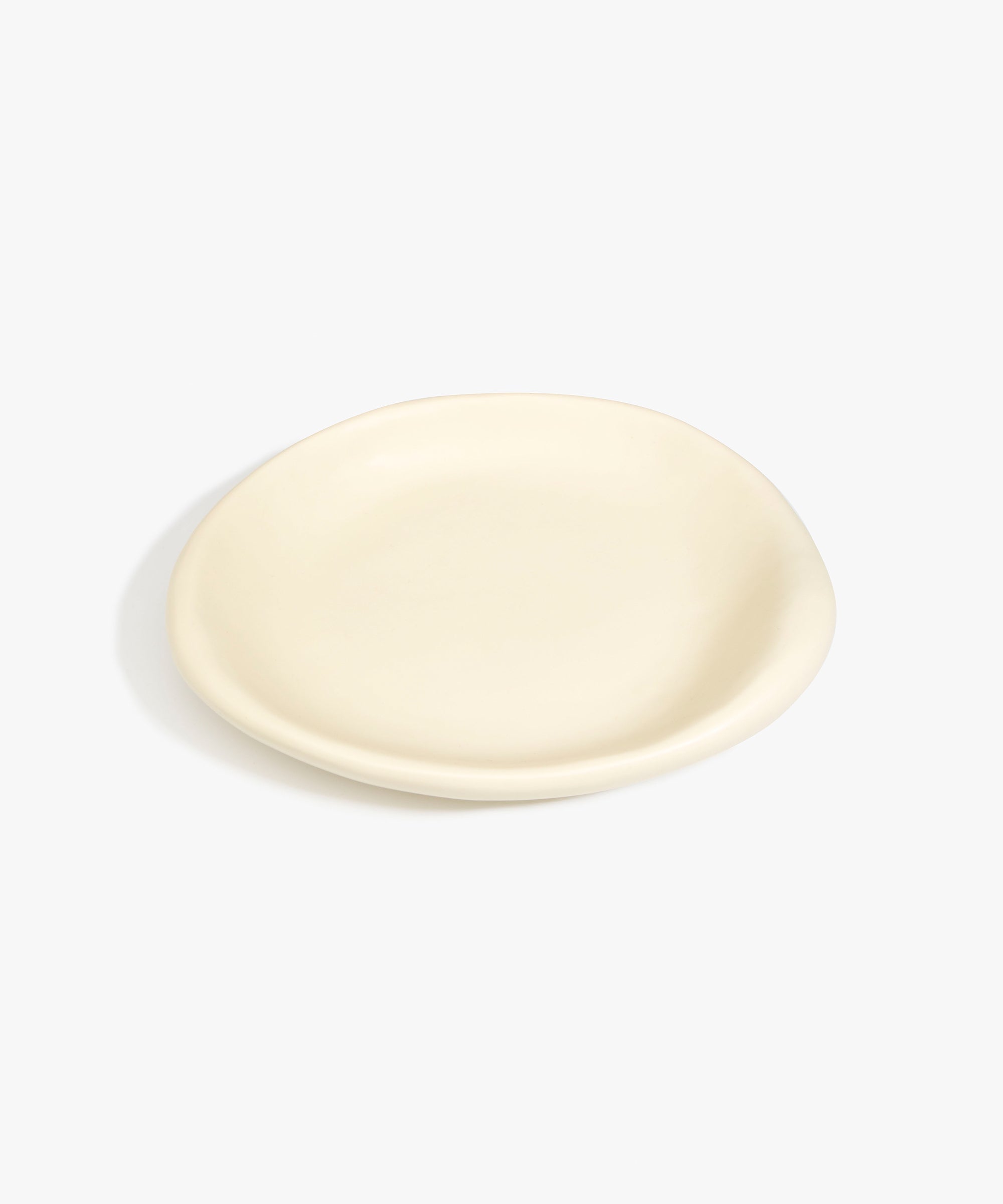 Dinosaur Designs Medium Bones Bowl in Cream — mid sized handmade cream resin shallow serving bowl with a rounded organic form