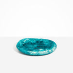 Dinosaur Designs Medium Bones Bowl in Lagoon — mid sized handmade marbled blue and cream resin shallow serving bowl with a rounded organic form