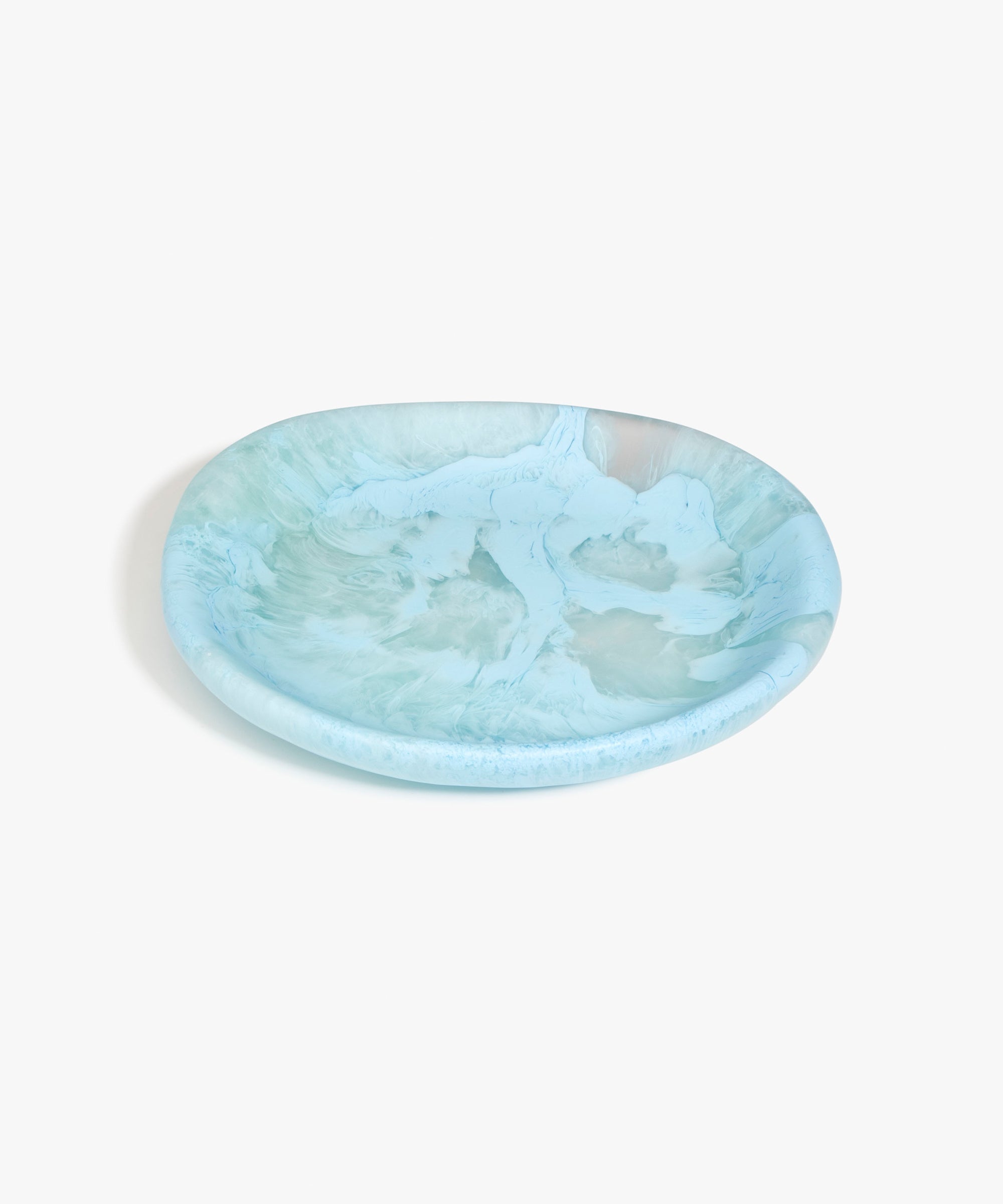 Dinosaur Designs Medium Bones Bowl in Pool — mid sized handmade marbled blue resin shallow serving bowl with a rounded organic form..